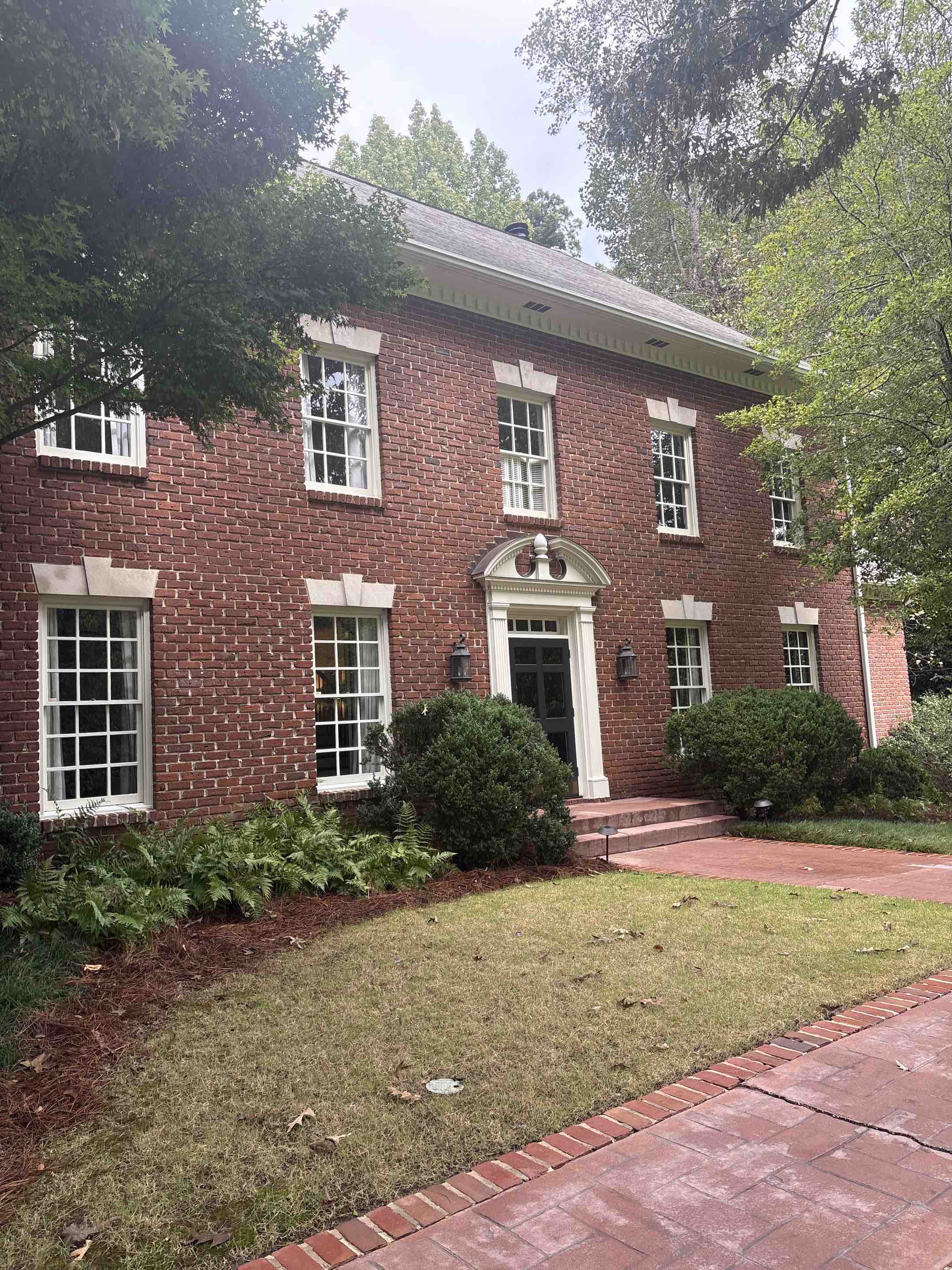 Birmingham, AL - Mountain Brooke, Alabama doing some pressure washing on brick patios and walkways for a long time Customer.