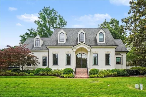Atlanta, GA - We meticulously cleaned all interior and exterior windows, pressure-washed the driveway, screened porch, and gently cleaned the wooden deck. Our attention to detail ensured a sparkling, fresh look.