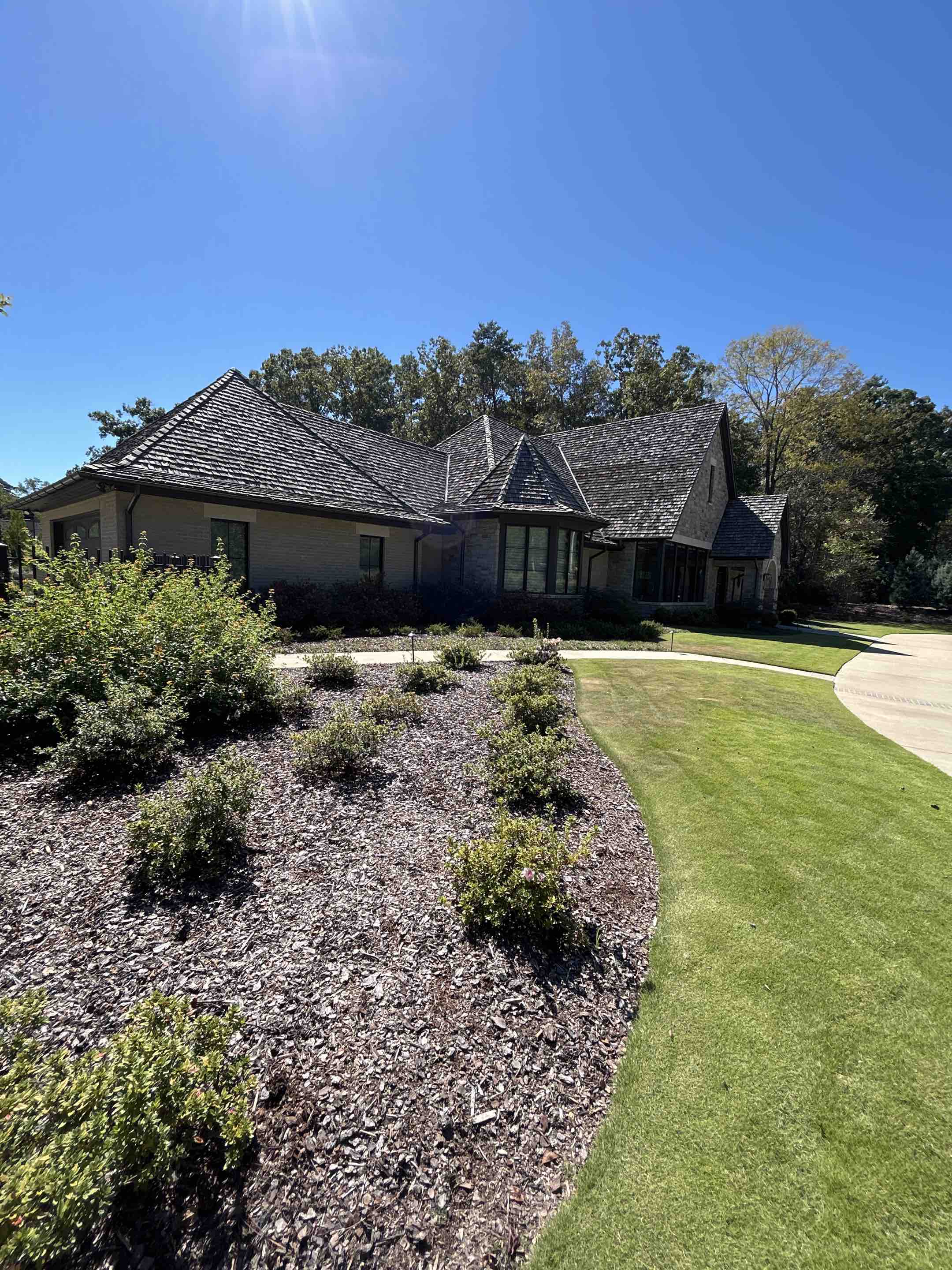 Birmingham, AL - Cleaned select interior as well as exterior windows, here, pressure wash, limestone top walls and cleaned out the valleys and some light fixtures