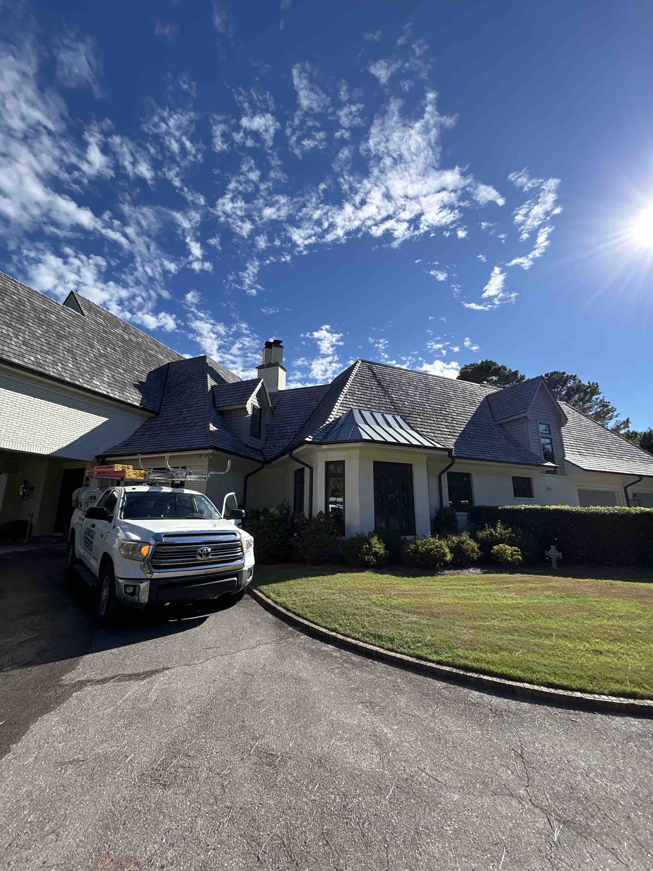 Birmingham, AL - Did exterior windows here with front porch and back porch area, pressure washing as well as gutter leaf removal and light fixture cleaning here