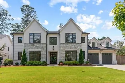 Atlanta, GA - I meticulously cleaned the exterior windows of this luxury home, removing dirt and streaks to reveal crystal-clear reflections. Each pane sparkled, enhancing the home's elegance and curb appeal.