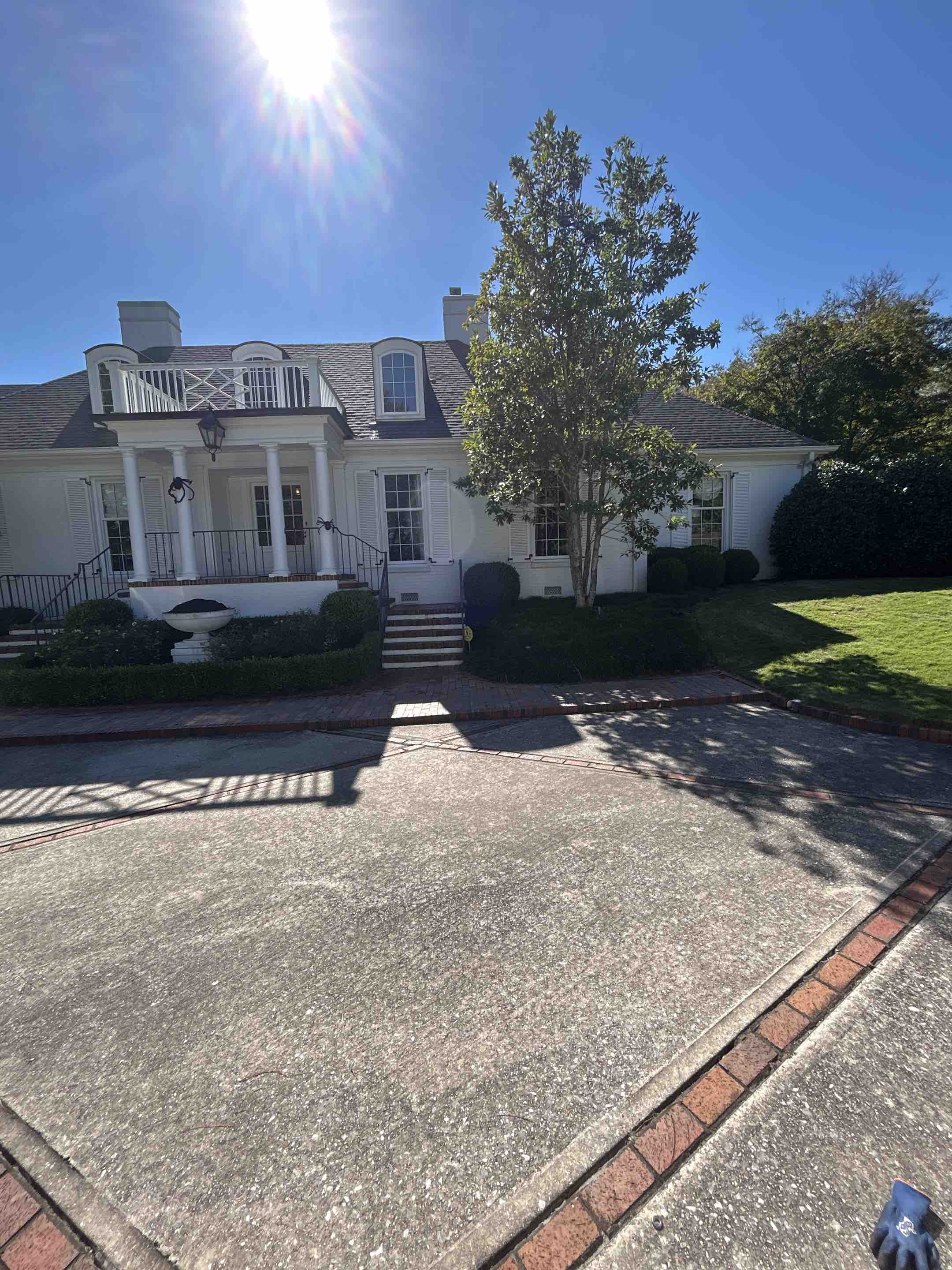 Birmingham, AL - Did exterior windows here with frame and sill detailing as well as gutter leaf removal and soft washing underneath carport and front porch