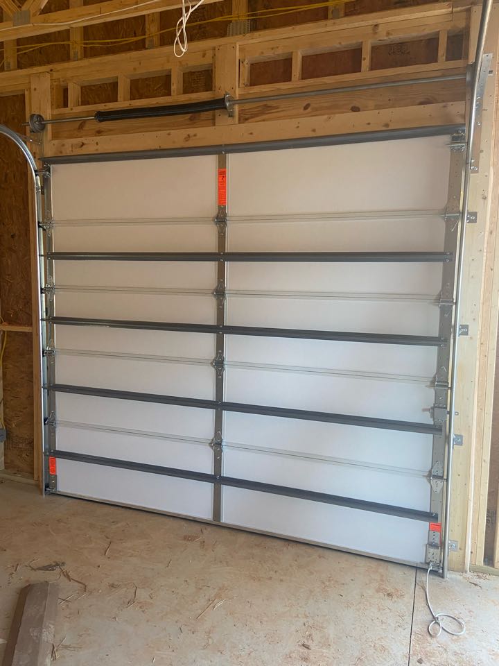 Installed a DoorLink 9’x8’ single one car garage door.
