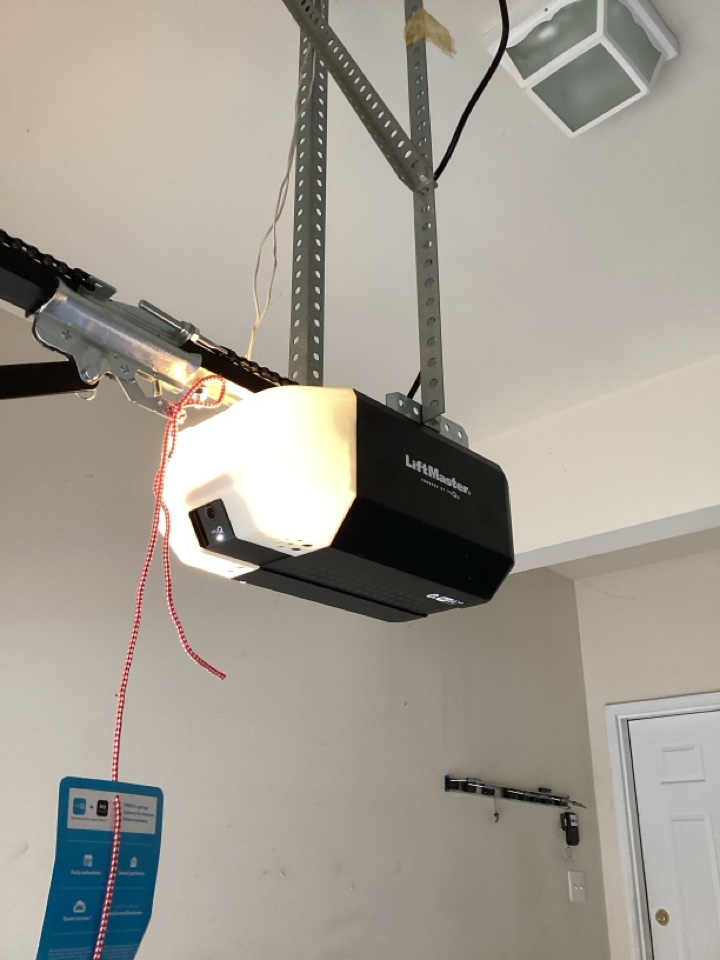 Install a LiftMaster DC chain operator.