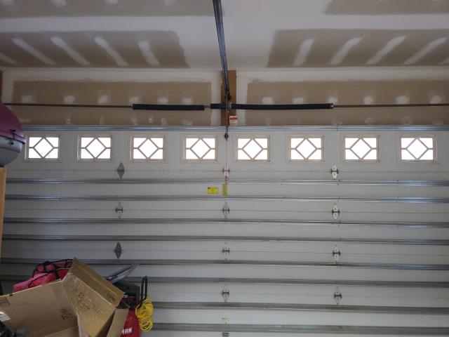 
I replaced a broken torsion spring on an Amarr garage door and performed a safety check and maintenance on a Liftmaster belt drive garage door operator.