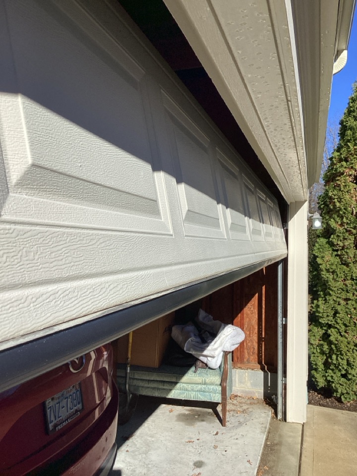 Replaced bottom rubber seal on their single two car metal garage ,door serviced door and operator.