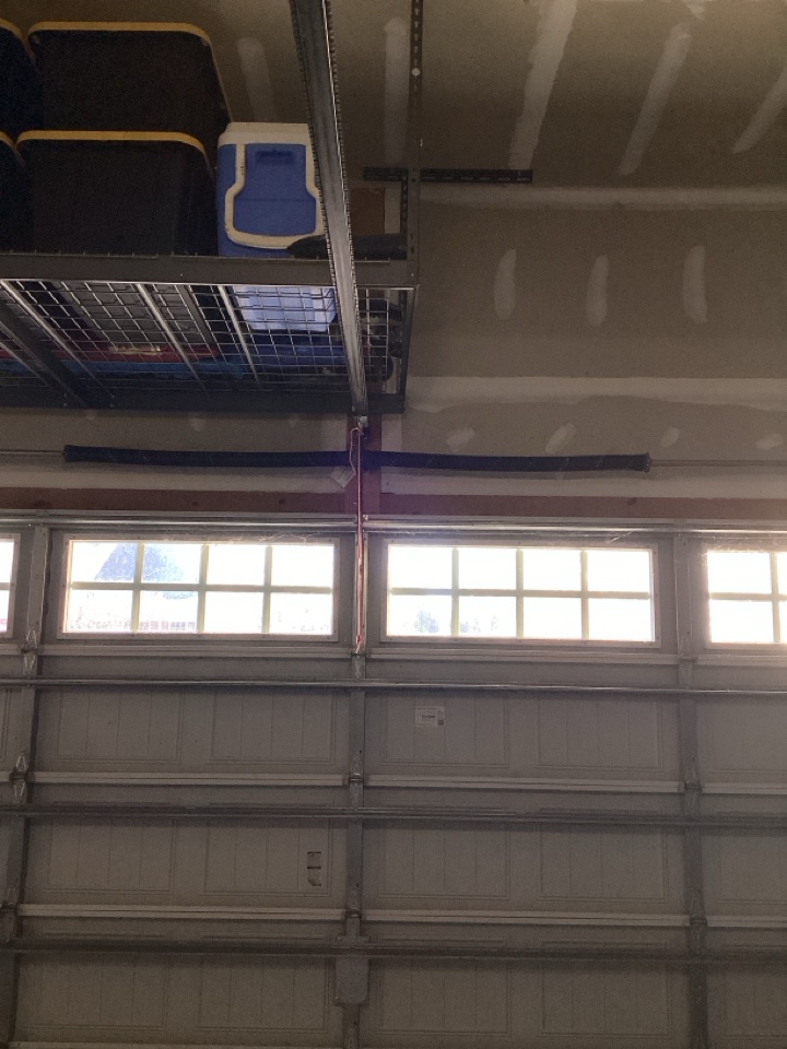 Install new torsion springs on a single two car metal garage door that were broken.