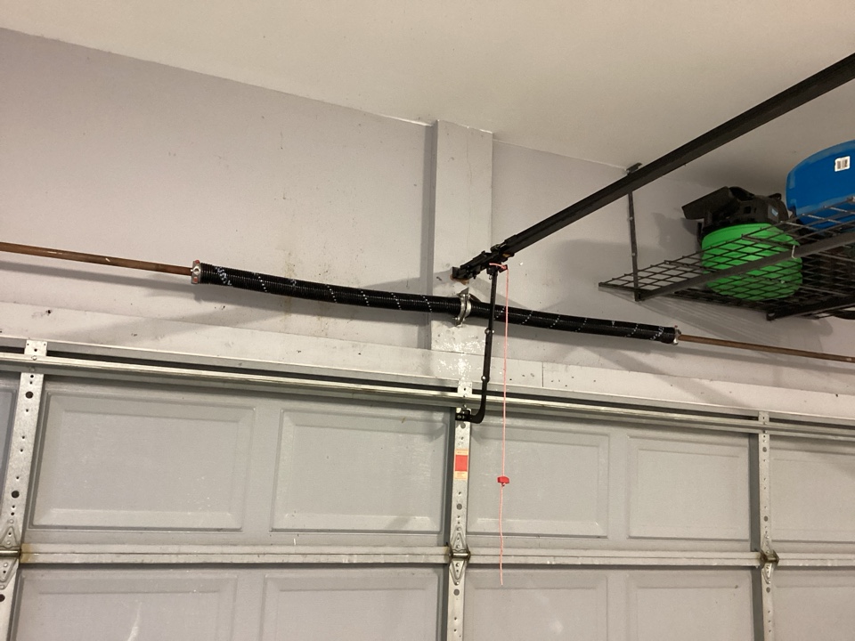 Replace torsion springs that were broken on a single two car metal garage.