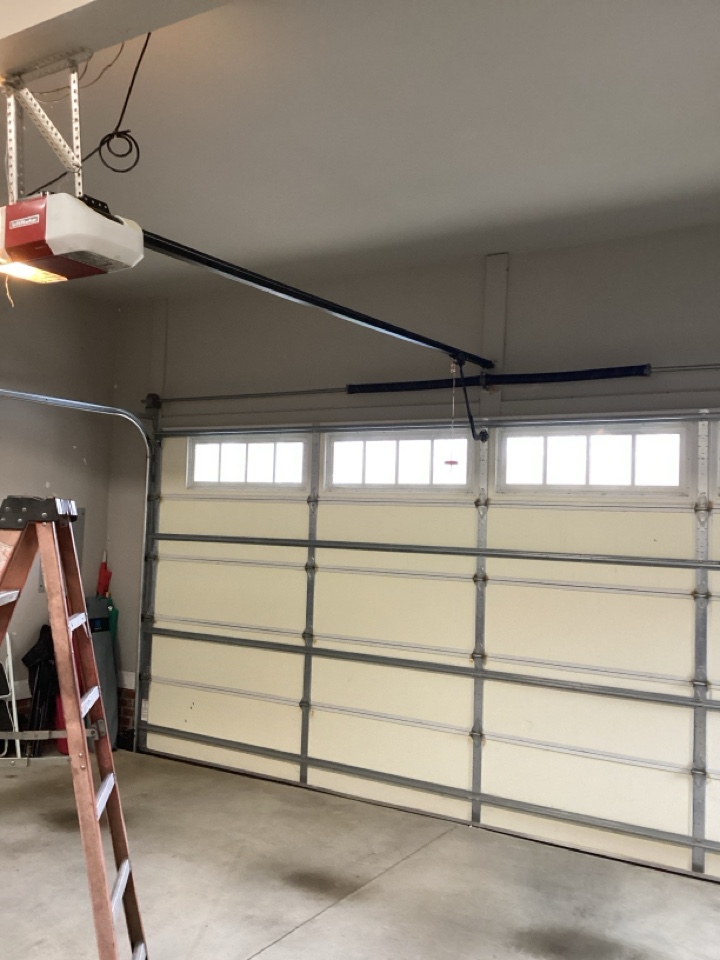 Service needed on a single two car, insulated garage door and LiftMaster belt operator.