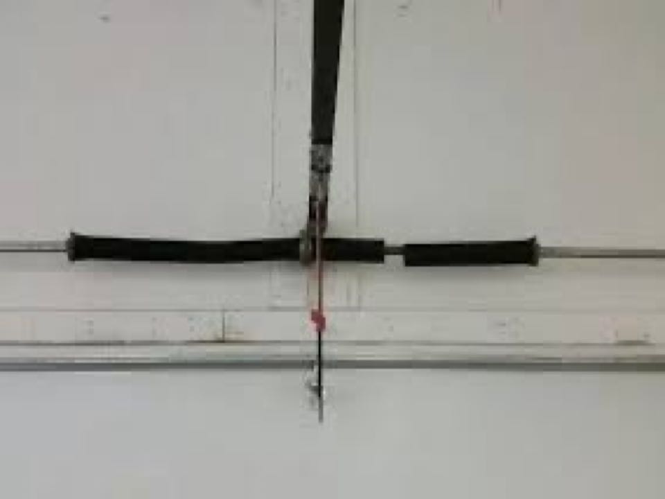 Replaced a broken torsion spring for a single two car insulated garage door.