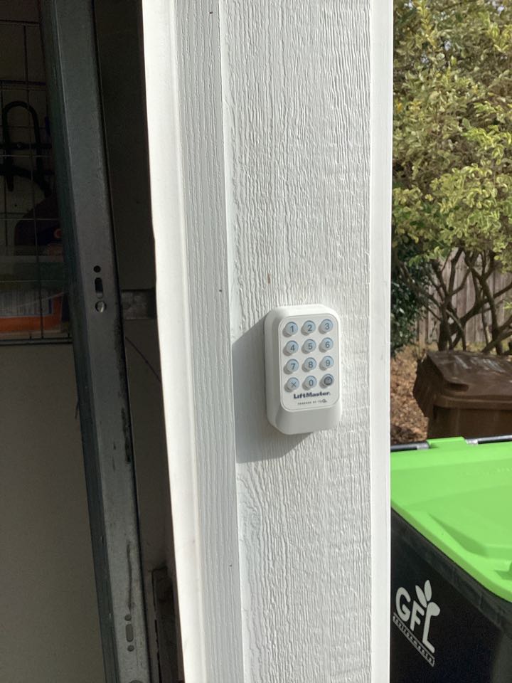 Serviced a single two car garage door and install installed a new keypad for a Chamberlain operator.