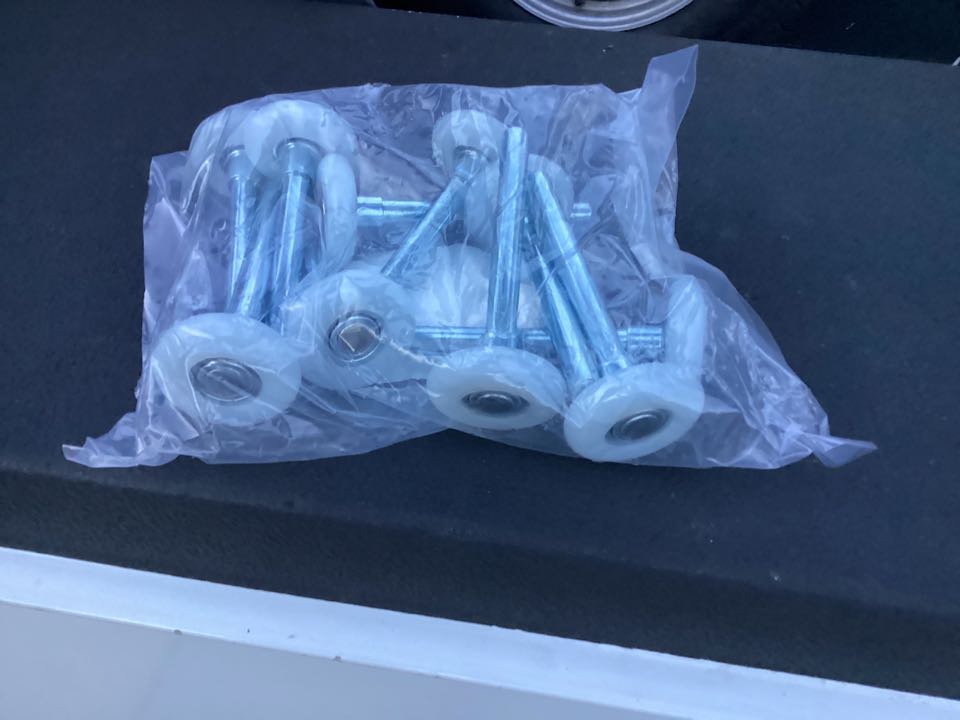 Garage door service needed for a single one car insulated garage door and replaced rollers with 13 ball bearing nylon coated rollers