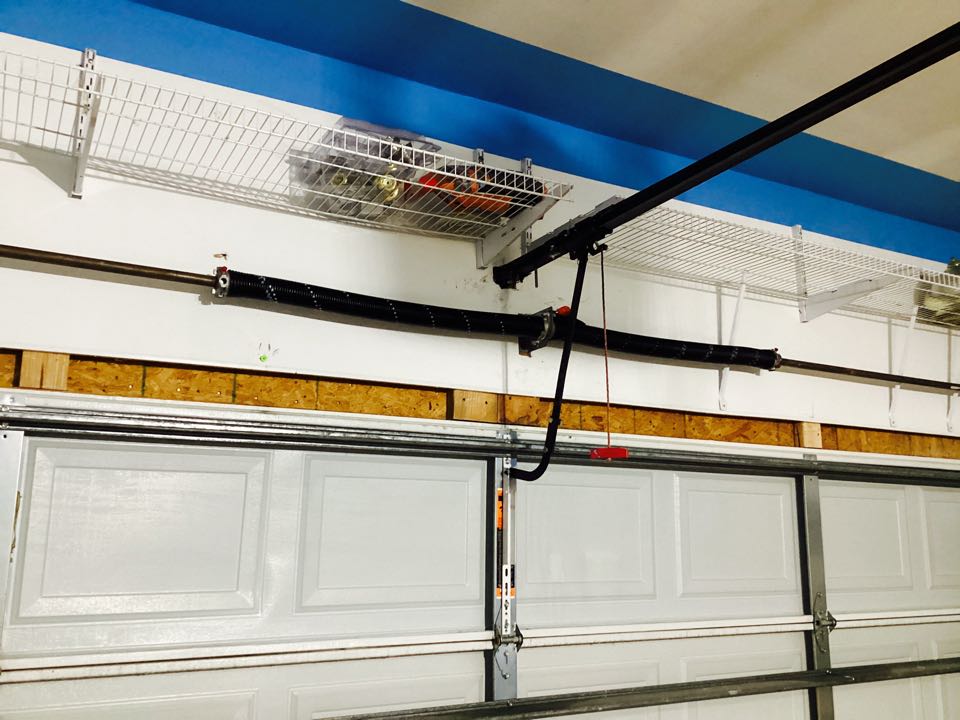 Replace broken contortion spring on a single two car metal garage door and replaced the belt for the LiftMaster garage door operator.