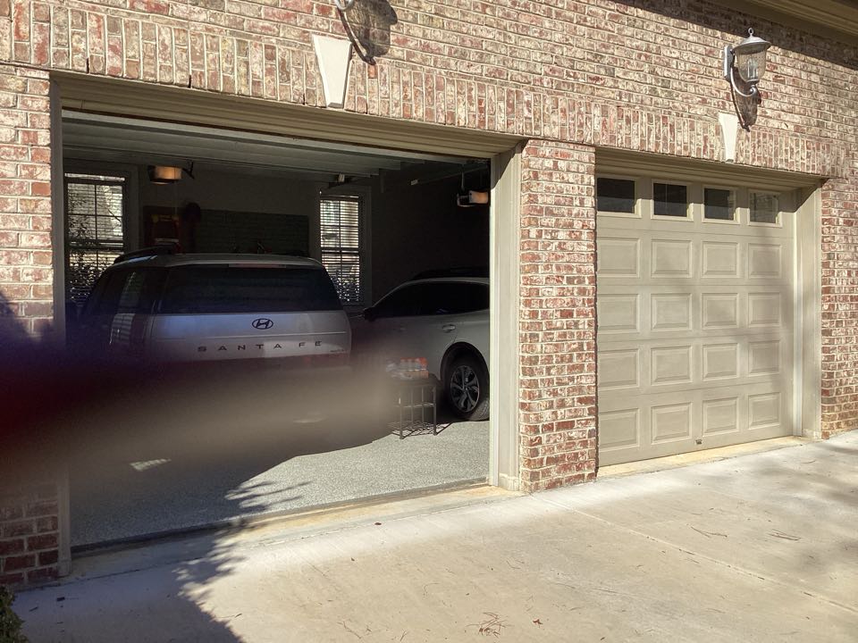 Serviced two single one car, insulated garage doors and LiftMaster garage door operators.