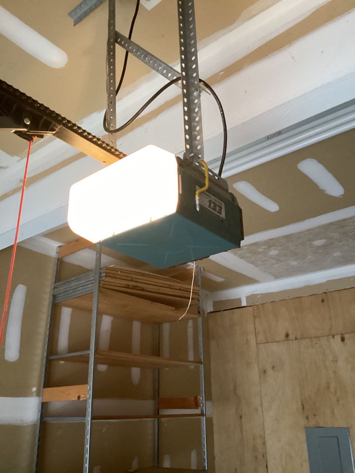 Proposed an estimate for replacing an old garage door opener with a new LiftMaster chain drive.