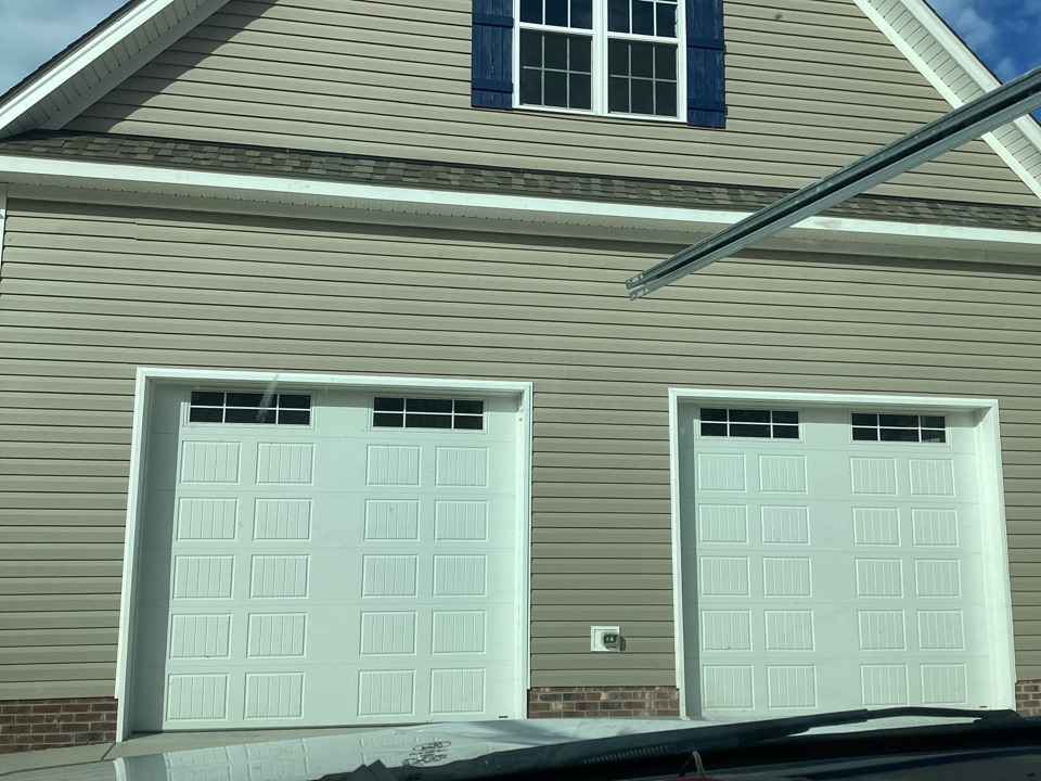 Garage door service needed for two single one car steel back high lift garage doors with side mount operators.