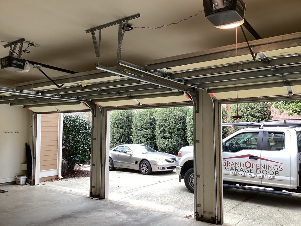 Service on three single one car, insulated garage doors and operators and replaced bottom rubber seal on all three doors.