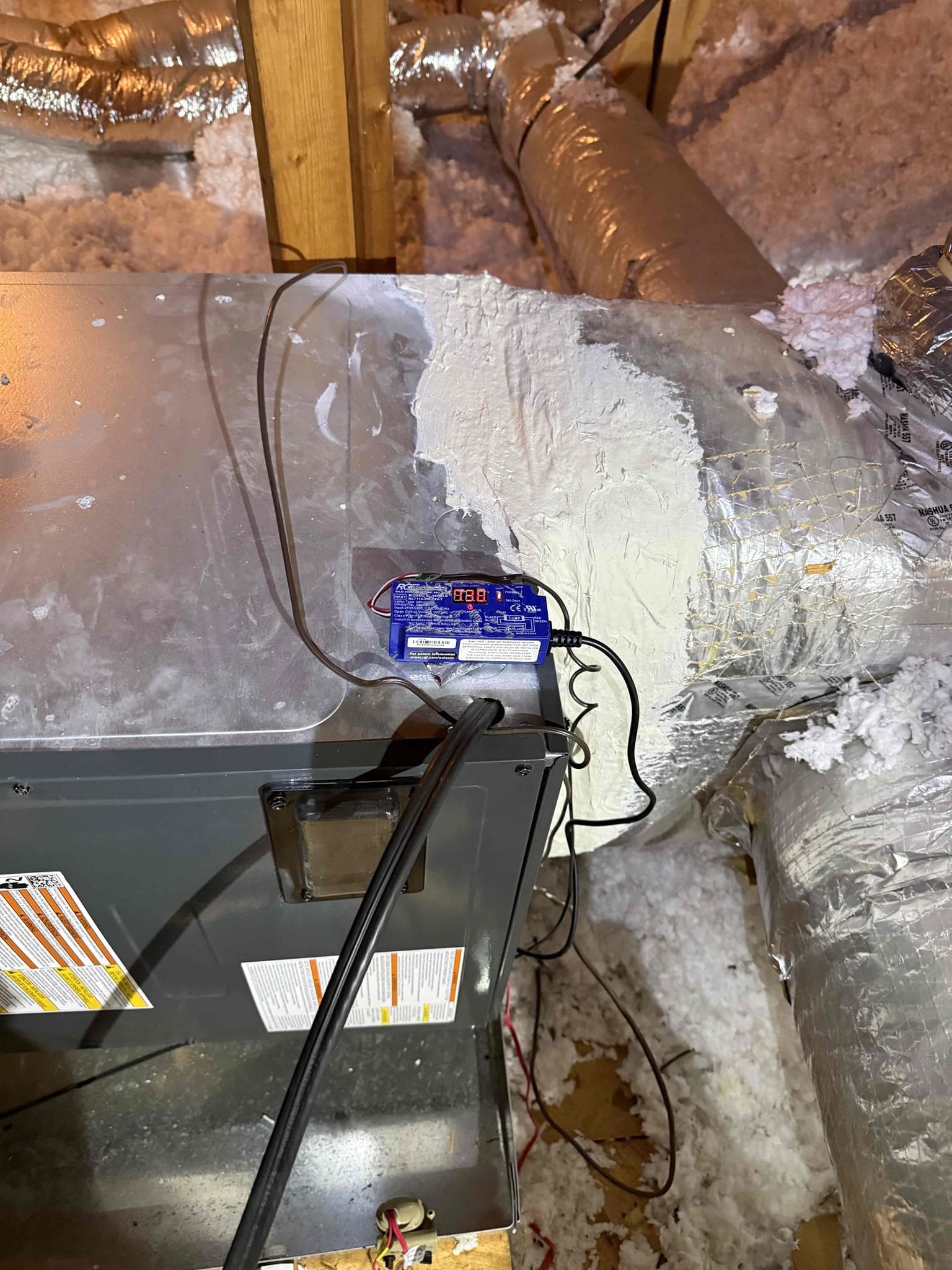 Installation UV lights inside of the air handler between the blower housing and coil. Installed safety switches on the secondary drain line and chained in to the other two switches on the auxiliary drain pan and ez trap