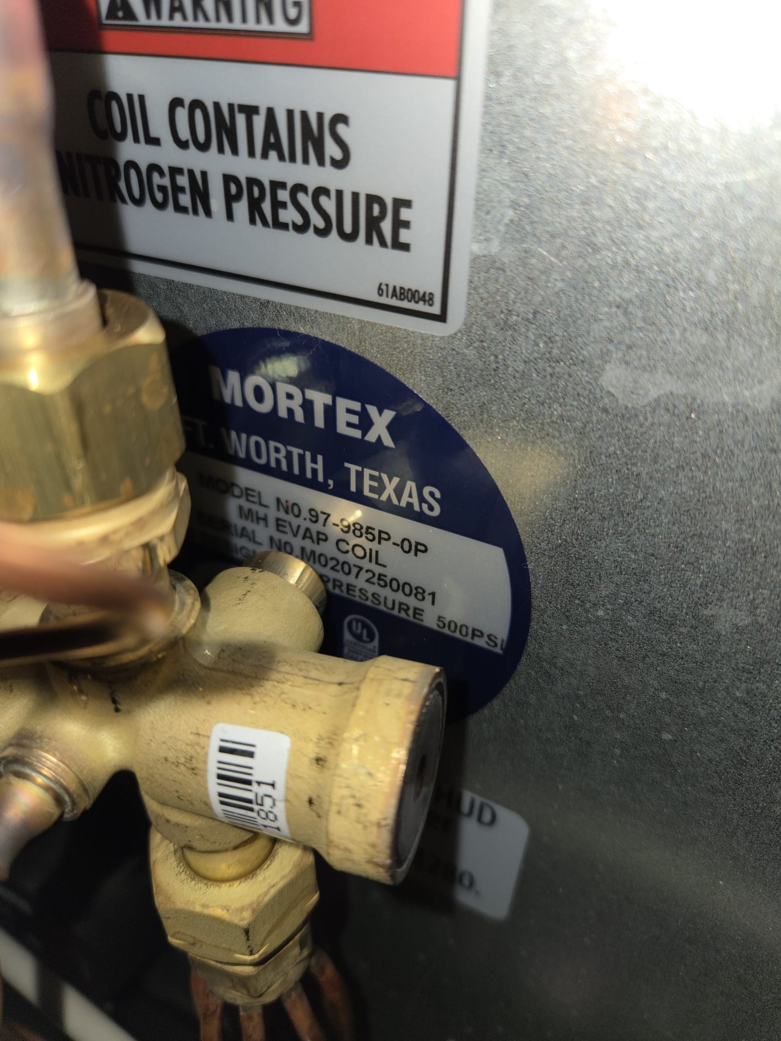 Replaced 2-ton heat pump with coil and electric furnace. Replaced pad, thermostat, disconnect and whip. Flushed line set. Reconnected drain line. Pressure tested and pulled a vacuum to below 500 microns. Verified system in heating mode. System is operational at time of departure.