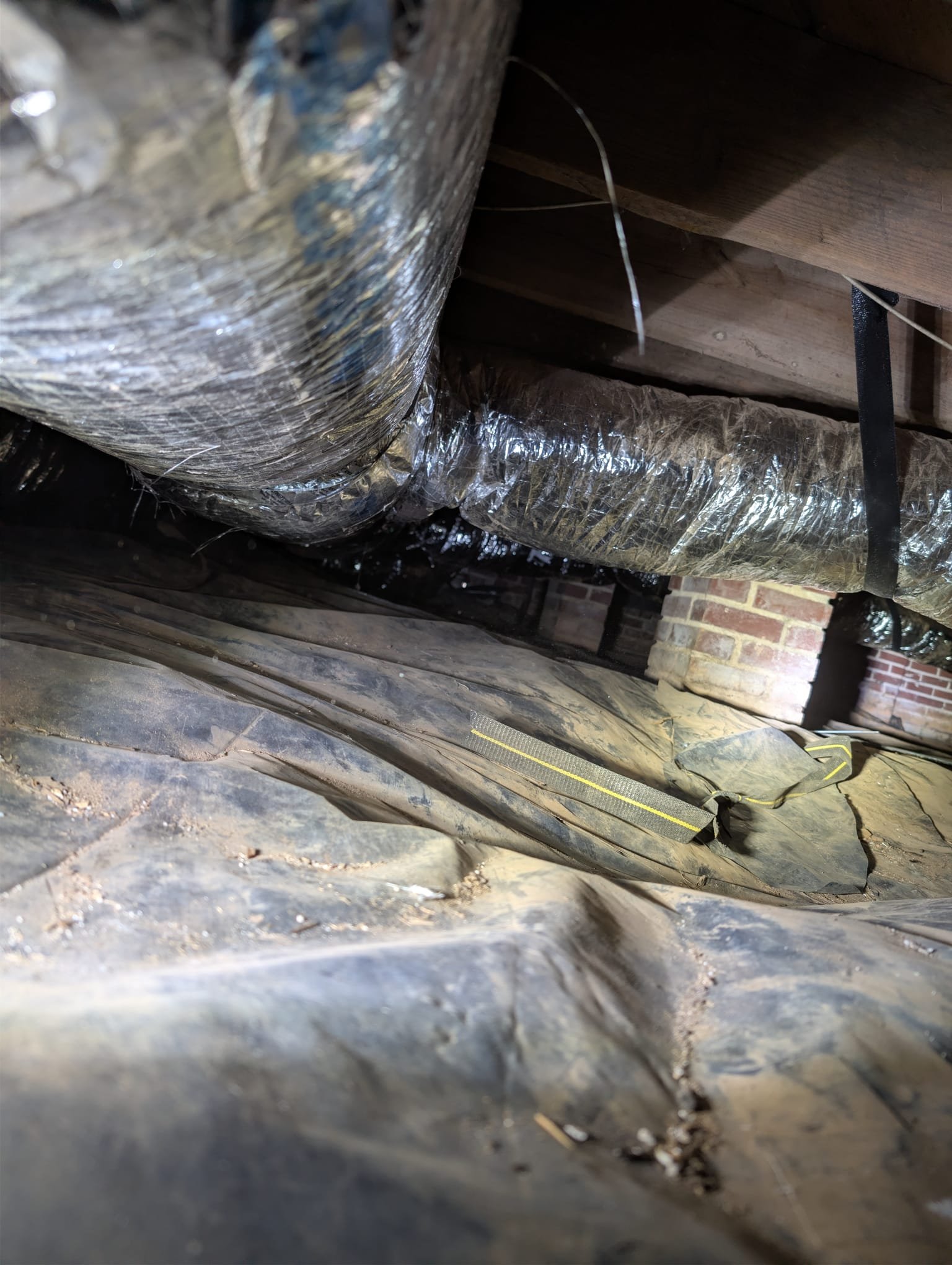 Removed and replaced 2 ton duct system. Installed 15 ft of hard pipe trunkline. Reconnected 6 supply runs. Upsized and replaced return as well return pipe. Replaced square to rounds and resealed flashing to package unit.