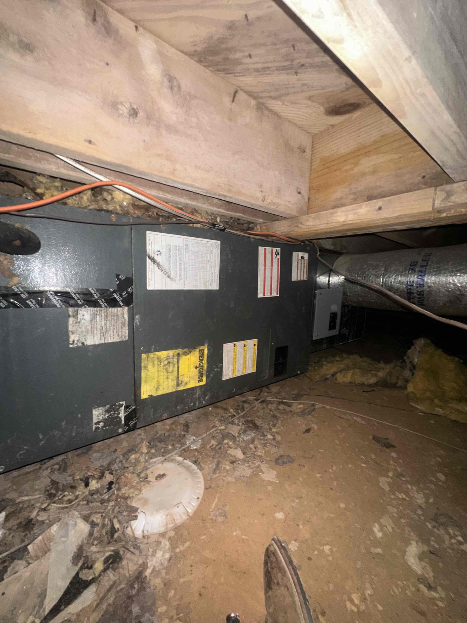 Arrived on site and performed a comprehensive diagnostic evaluation of the HVAC system, including a full system check of refrigerant levels, operating pressures, and overall performance. During testing, the system was found to be operating with low refrigerant levels, indicating a potential leak within the system.

Further diagnostic procedures were performed, including a detailed inspection of the evaporator coil located inside the air handler. It was determined that the coil has developed a refrigerant leak at two separate U-bends, which is the primary cause of the low refrigerant condition and reduced system efficiency. Due to the location and nature of the leaks, repair would be difficult and may not provide a long-term solution.

All findings were clearly communicated to the customer, along with a thorough review of available repair and replacement options. After discussing the condition of the system, its age, and the cost-effectiveness of repairs versus replacement, the customer