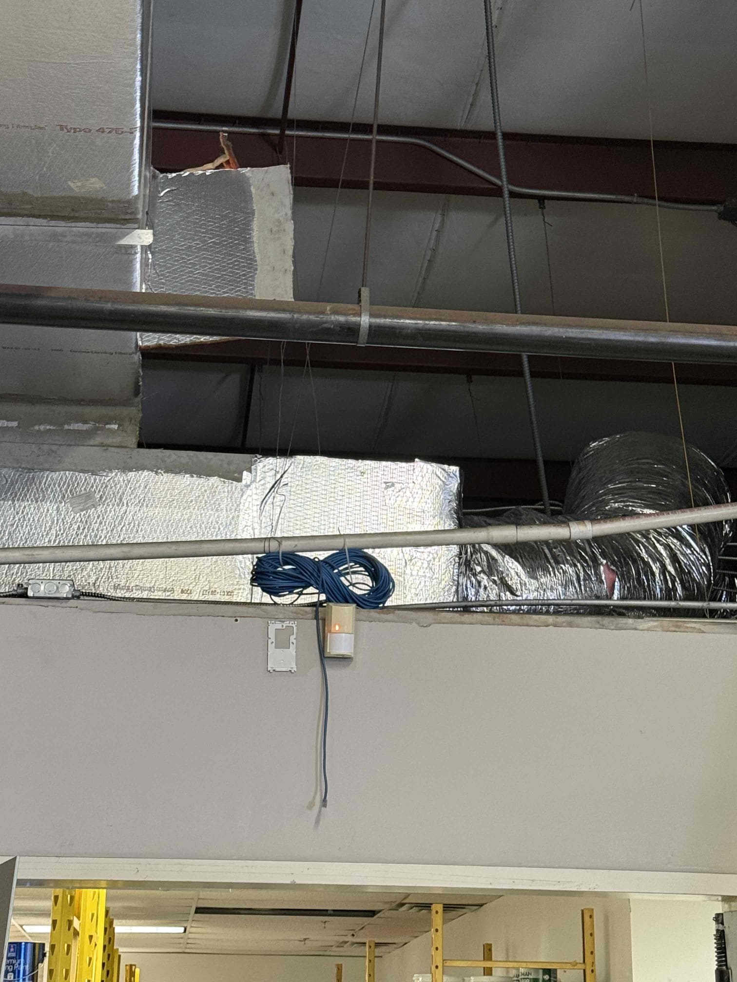 Finished installing the returned duct and drain pan. 