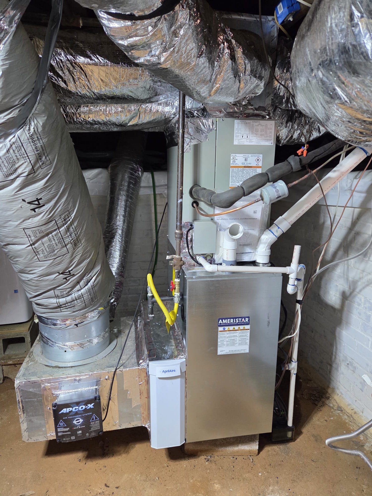 Replaced 2 ton ac/coil and furnace. Swapped from an 80% to a 90% furnace. Installed new thermostat, pad, disconnect, whip. Installed a 16x25x4 aprilaire filter. Installed condensate pump and pulled new thermostat wire from inside to outside with the vinyl tubing. Ran new 2" PVC flue pipe. Verified operation in heating mode. System is operational at time of departure.