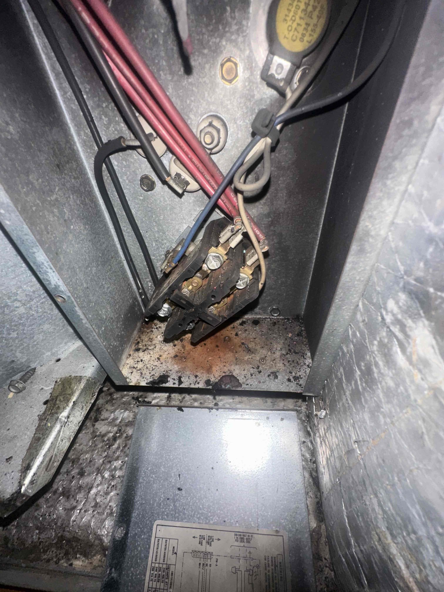 Arrived on site to evaluate HVAC system reported as non-operational. Upon initial inspection, discovered evidence of an electrical fire within the system’s electrical cabinet. Conducted a thorough diagnostic of all major components and electrical connections. Findings indicate that a severe electrical short within the wiring led to extensive damage inside the cabinet.

As a result of this failure, both the blower motor and compressor have been compromised and are no longer operational. The wiring insulation shows signs of burn and deterioration, creating unsafe operating conditions and preventing the system from functioning properly.

Due to the extent of electrical damage and component failure, the system is currently inoperable and requires major repairs or potential full system replacement. Recommended discussing repair versus replacement options with the customer, taking into consideration the age of the system, cost of parts, and overall reliability moving forward. Customer has be