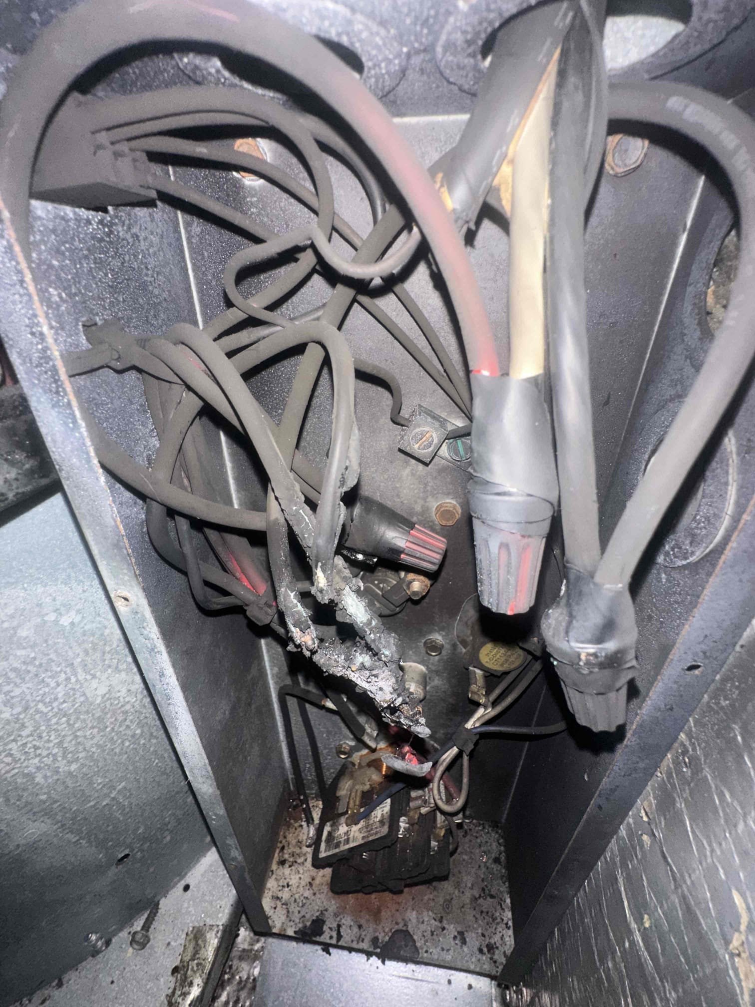 Arrived on site to evaluate HVAC system reported as non-operational. Upon initial inspection, discovered evidence of an electrical fire within the system’s electrical cabinet. Conducted a thorough diagnostic of all major components and electrical connections. Findings indicate that a severe electrical short within the wiring led to extensive damage inside the cabinet.

As a result of this failure, both the blower motor and compressor have been compromised and are no longer operational. The wiring insulation shows signs of burn and deterioration, creating unsafe operating conditions and preventing the system from functioning properly.

Due to the extent of electrical damage and component failure, the system is currently inoperable and requires major repairs or potential full system replacement. Recommended discussing repair versus replacement options with the customer, taking into consideration the age of the system, cost of parts, and overall reliability moving forward. Customer has be