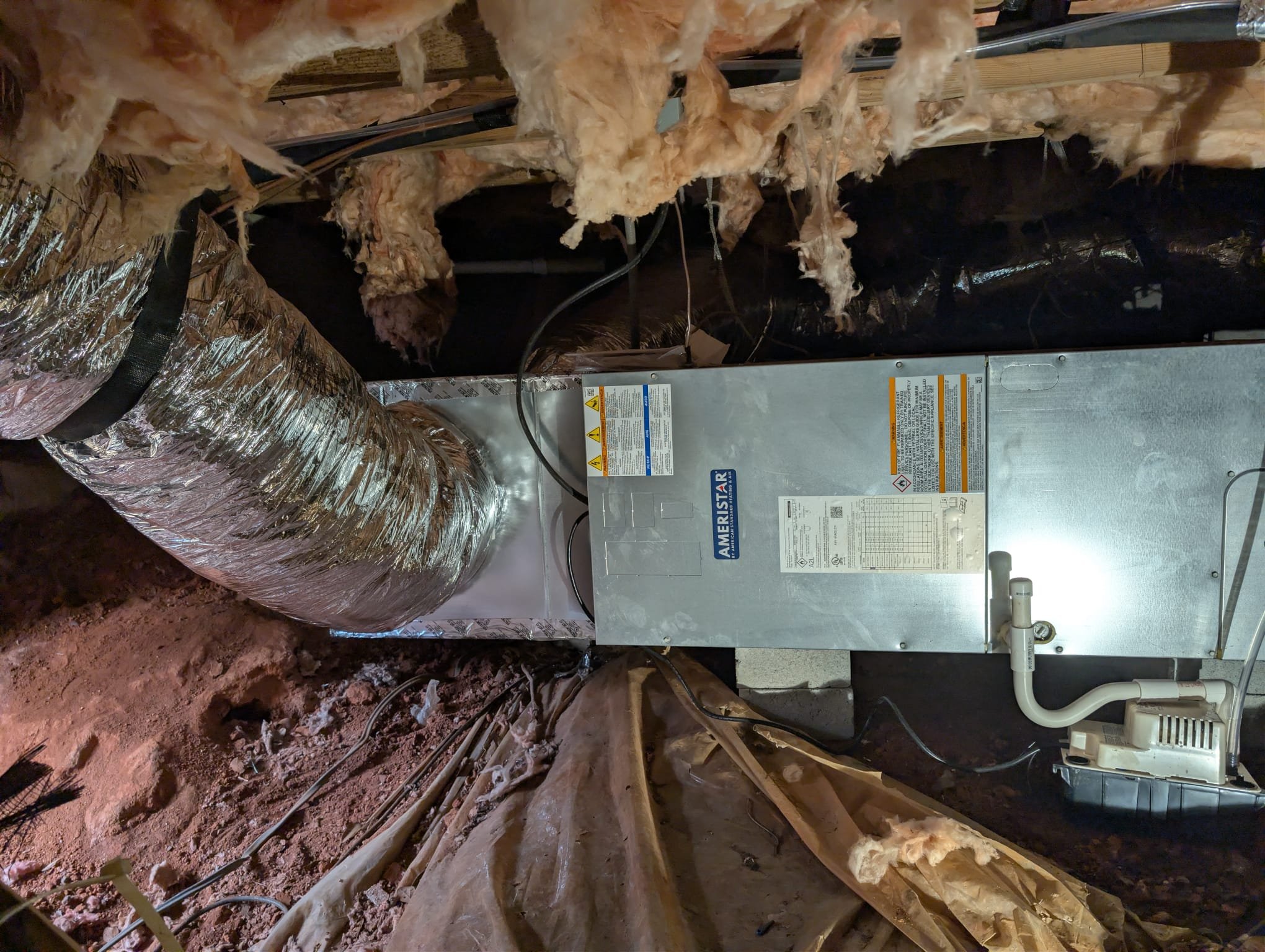 Replaced 2 ton heat pump air handler, installed new disconnect under home to bring up to code and replaced existing disconnect for the outdoor unit. Replaced pad, whip, thermostat, line set. Installed condensate pump. Verified operation in cooling mode. System is operational at time of departure.

BRING HOSE TO FLUSH WATER HEATER NEXT MAINTENANCE VISIT. Dean promised we would flush the tank for her but we don't carry hoses on the truck.