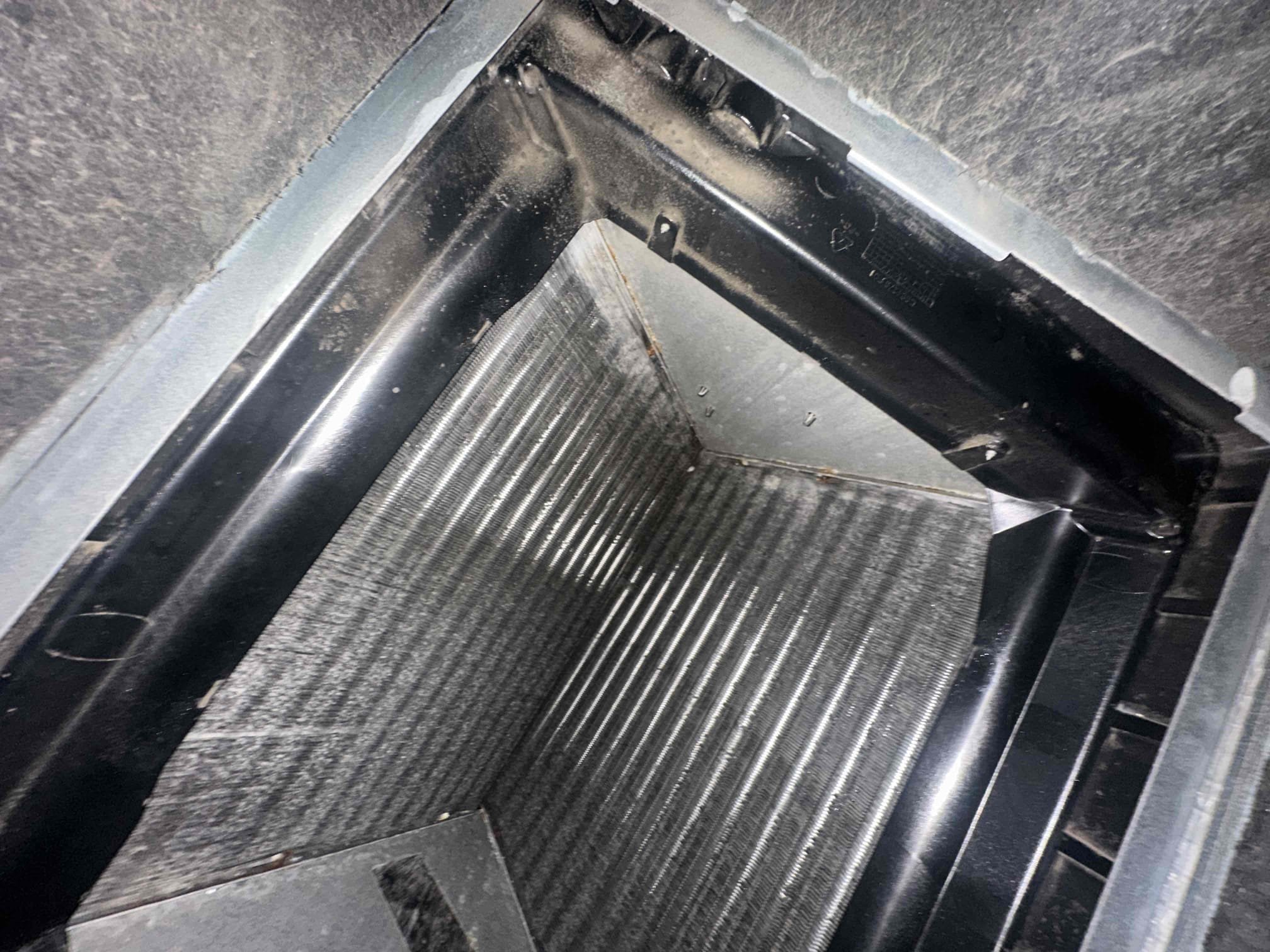Arrived on site and performed a complete system evaluation. Found the system operating with extremely high static pressure caused by a collapsed return duct. Upon inspection, the return ductwork appears to have been improperly installed, resulting in restricted airflow throughout the system.

Further diagnostics revealed compressor failure. Customer advised that the compressor had previously been replaced by Skyward; however, the replacement compressor has failed again within approximately two years. Based on testing and inspection, the internal compressor windings are deteriorating and coming apart, likely due to prolonged operation under restricted airflow conditions caused by the collapsed return.

At this time, the return duct issue must be addressed to restore proper airflow and prevent future equipment failures. Will contact the supply house on Monday to verify warranty status for the equipment and compressor. Also need to consult with Quentin regarding parts availability and nex