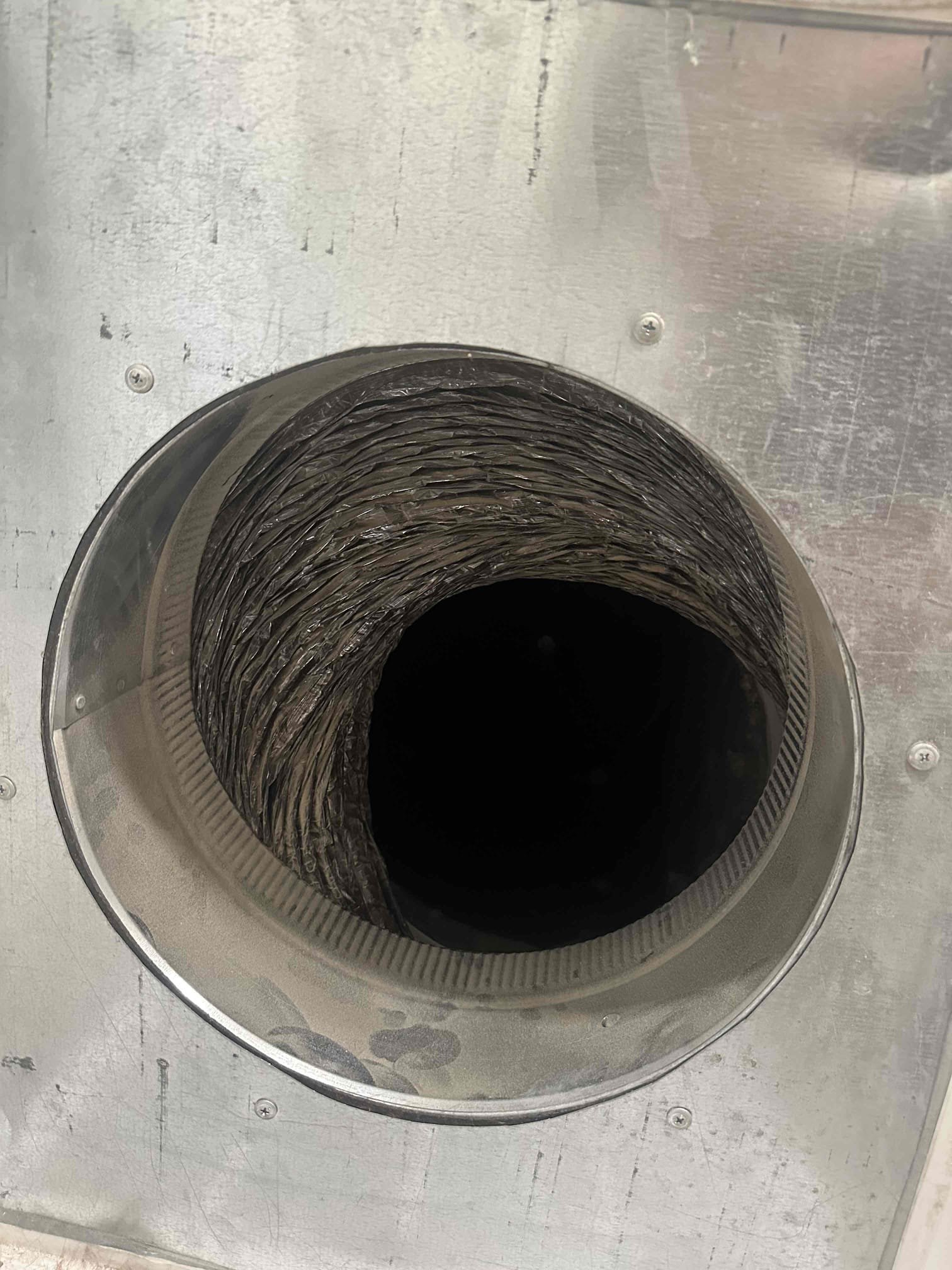 Arrived on site and performed a complete system evaluation. Found the system operating with extremely high static pressure caused by a collapsed return duct. Upon inspection, the return ductwork appears to have been improperly installed, resulting in restricted airflow throughout the system.

Further diagnostics revealed compressor failure. Customer advised that the compressor had previously been replaced by Skyward; however, the replacement compressor has failed again within approximately two years. Based on testing and inspection, the internal compressor windings are deteriorating and coming apart, likely due to prolonged operation under restricted airflow conditions caused by the collapsed return.

At this time, the return duct issue must be addressed to restore proper airflow and prevent future equipment failures. Will contact the supply house on Monday to verify warranty status for the equipment and compressor. Also need to consult with Quentin regarding parts availability and nex