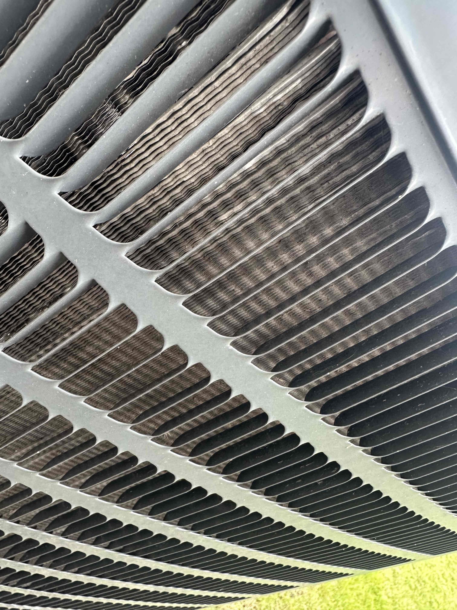 Service Report

Arrived on site and performed a full evaluation of the HVAC system. Upon inspection, the system was found to be operating properly and cooling as designed. Completed a thorough cleaning of the outdoor condensing unit to remove accumulated dirt and debris that could restrict airflow and reduce system efficiency. After cleaning, verified that airflow and overall system operation remained within normal operating parameters.

During the inspection, it was noted that there are unsealed openings around the line set penetration where the refrigerant lines enter the structure. Recommend properly sealing these gaps to help prevent air infiltration, moisture intrusion, pest entry, and potential energy loss. Proper sealing will also improve the overall efficiency and performance of the system.

Additionally, discussed the benefits of installing an Indoor Air Quality (IAQ) solution with the homeowner. Highly recommend an IAQ system to help reduce airborne contaminants, improve filt