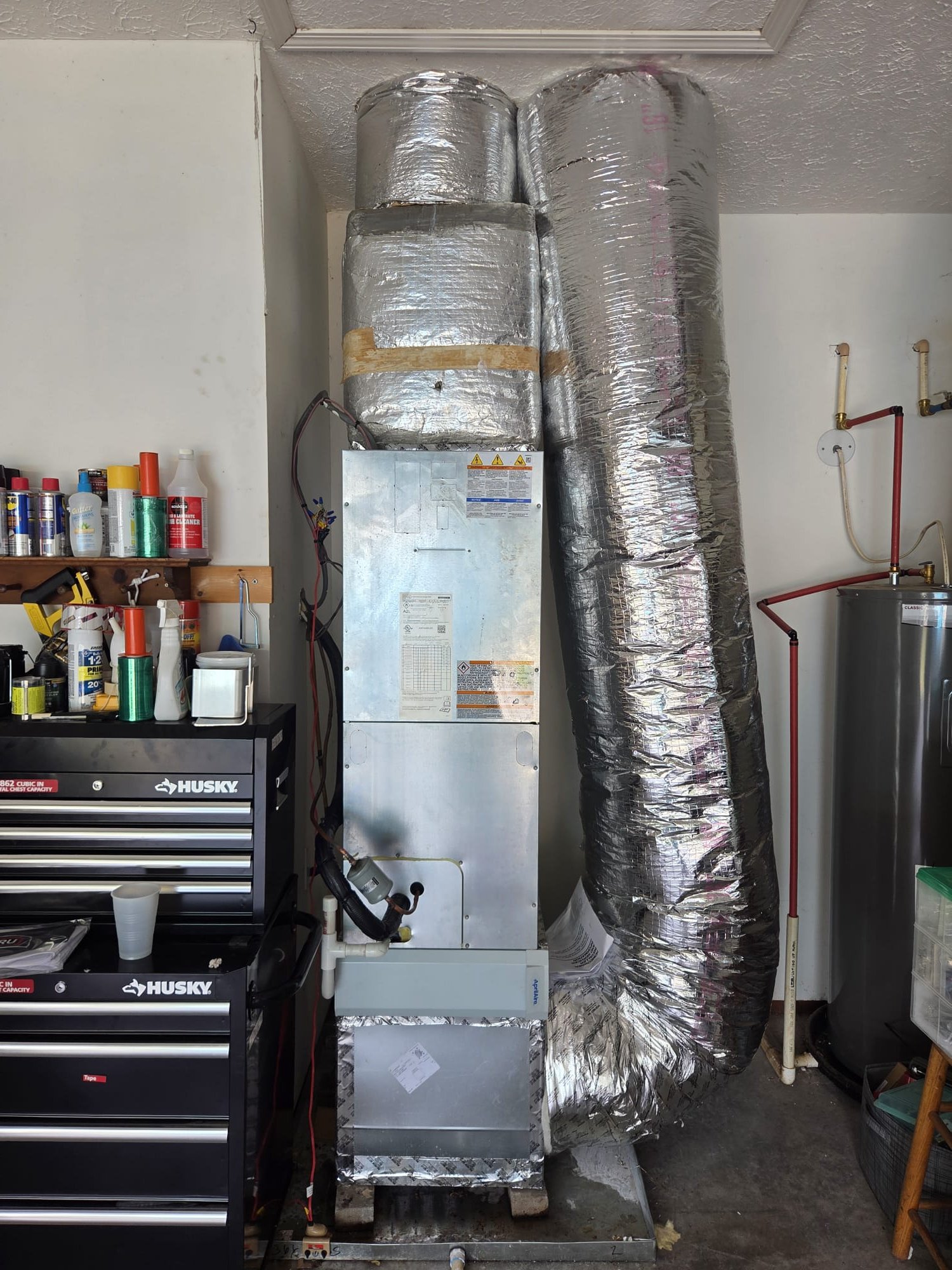 Removal of old split system and installation of new 2.5 ton heat pump/AC and 2.5 ton air handler w/ auxiliary heat