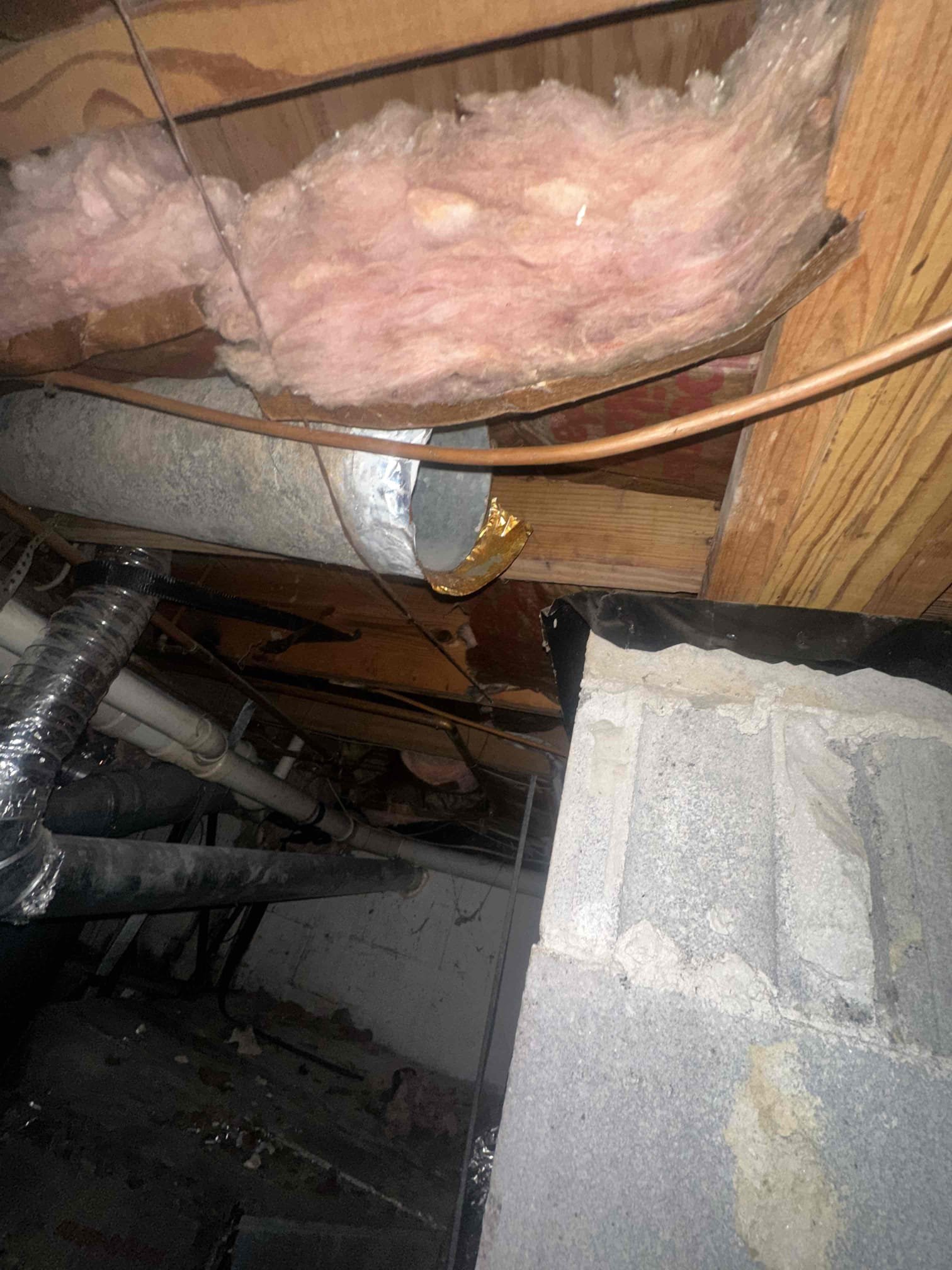 Arrived on site and performed a thorough inspection of the HVAC system. Diagnosed and repaired a condensate drain leak, restoring proper drainage and preventing further water intrusion. After completing the repair, the system was tested and the drain was confirmed to be operating correctly.

During the inspection, additional deficiencies were identified that require corrective action. One of the supply duct runouts is damaged and will need to be replaced to restore proper airflow. An air leak was also found within the ductwork located in the crawlspace, resulting in conditioned air loss and reduced system efficiency. Replacement of the affected flexible duct (flex) is recommended to eliminate the leak and improve overall airflow throughout the home.

Additionally, the main supply duct system is in poor condition and is showing signs of deterioration. The supply trunk should be repaired or replaced as needed, and the existing transition should be rebuilt to provide proper airflow, impro