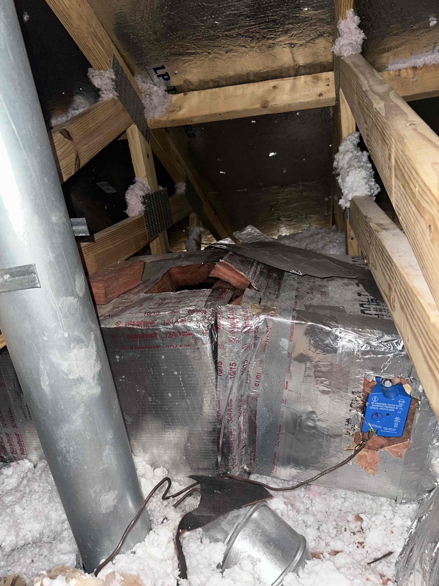 Arrived on site and performed a complete inspection and operational evaluation of the HVAC system. During testing, it was determined that the system was not delivering proper airflow throughout the home and was only producing a 12°F temperature split, indicating inadequate cooling performance.

A thorough inspection of the duct system revealed a large opening in the upstairs ductwork, allowing a significant amount of conditioned air to escape before reaching the occupied living space. Based on the inspection, this issue appears to have been caused by a previous contractor who failed to properly seal and insulate the duct penetration during a prior repair or installation. The unsealed opening is resulting in substantial air loss, reduced system efficiency, and insufficient airflow to the affected areas of the home.

At this time, the HVAC equipment is operational; however, it is not cooling the home properly due to the significant airflow loss caused by the damaged and improperly sealed