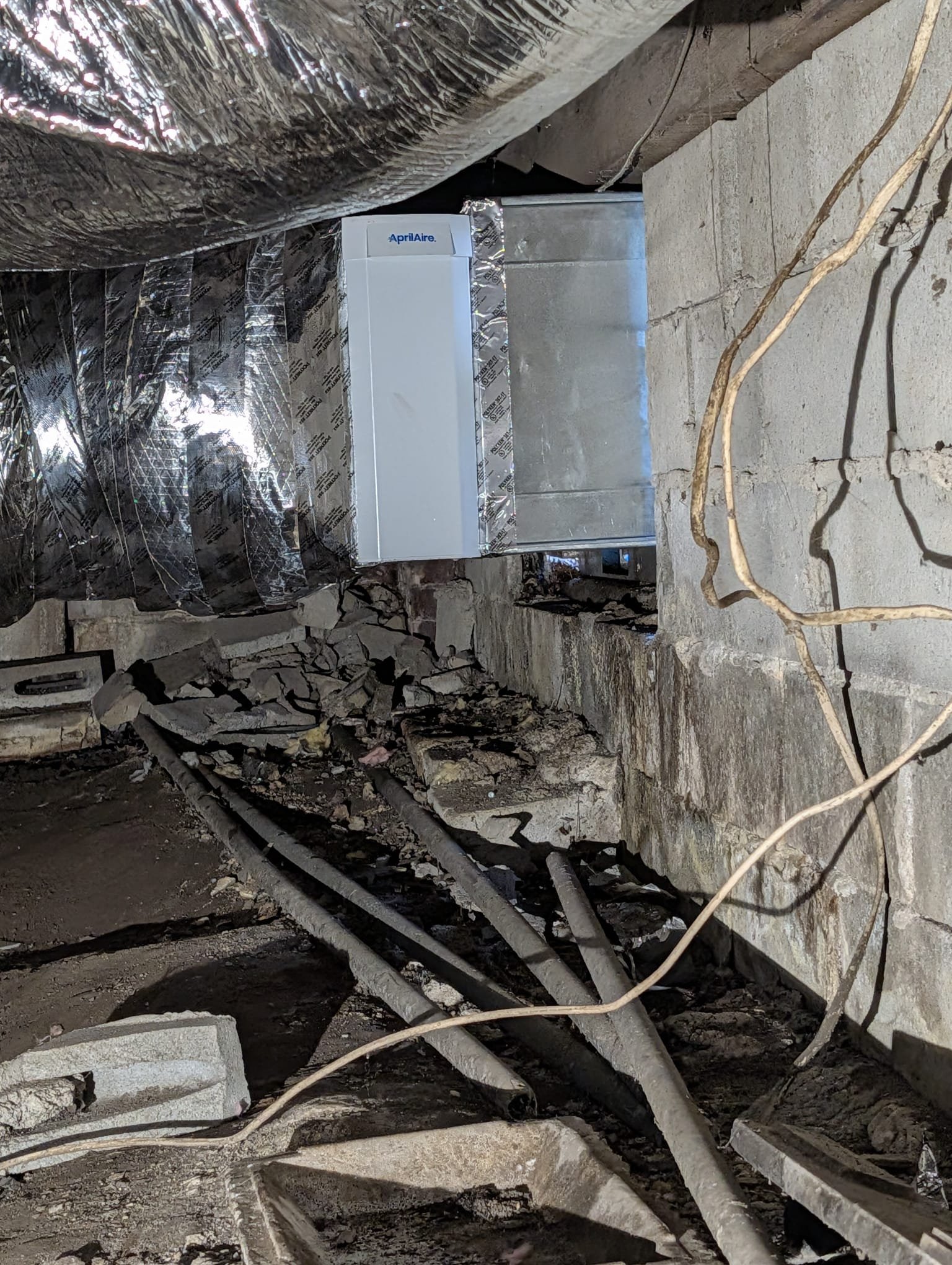Removal of existing ductwork and installation of new 2 ton duct design.

Installed P4 box and installed 16x20x4 aprilaire cabinet. Upsized return to a 16" to pull more airflow through the coil. Installed surge protection on unit. System is operational at time of departure.