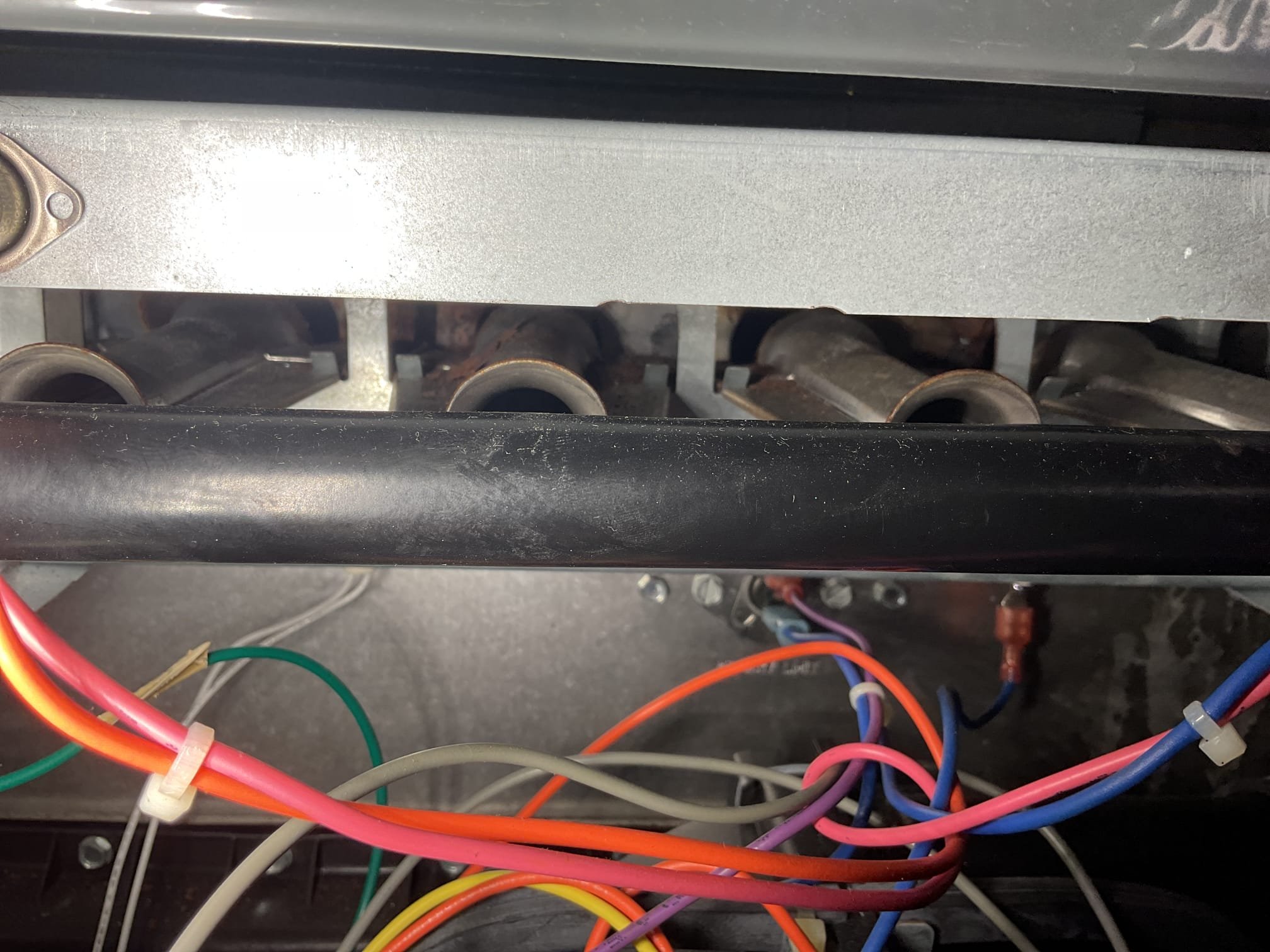 Fully assessed no cooling situation. Found failed 45/5 capacitor. Provided solutions to replace just the capacitor or replace the capacitor and add a hard start to assist the compressor on start up to help with longevity of the compressor, homeowner went with this solution. Installed and tested operation of a/c. Also homeowner mentioned that his furnace does not always start up on first try, found burners very rusted and corroded recommend replacing with stainless steel burners to prevent corrosion. Check 410a refrigerant pressures they were  223/128 with 5.7 subcooling. Could smell propane while we were outside we found a leak at fitting on propane tank and told him to contact the propane company to repair. A/c is working properly at time of service. 