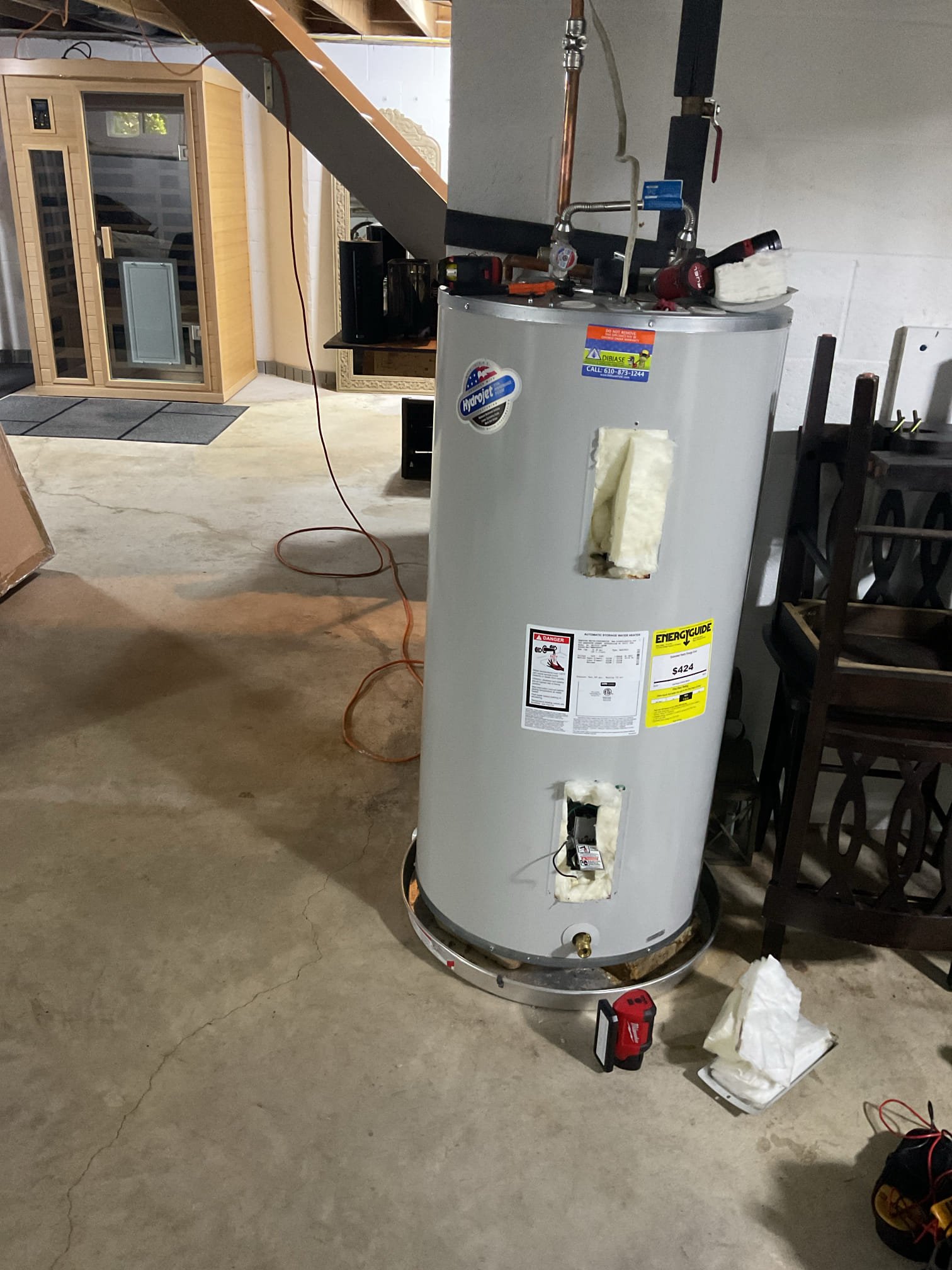 Found water heater Only putting out 102 degrees. Took off covers and found small leak in tank itself and insulation was wet. Found bottom thermostat is also bad because of the leaking tank and also after talking to homeowner he would like more hot water, recommend installing a 50 gallon power vented propane water heater. Provided options 
