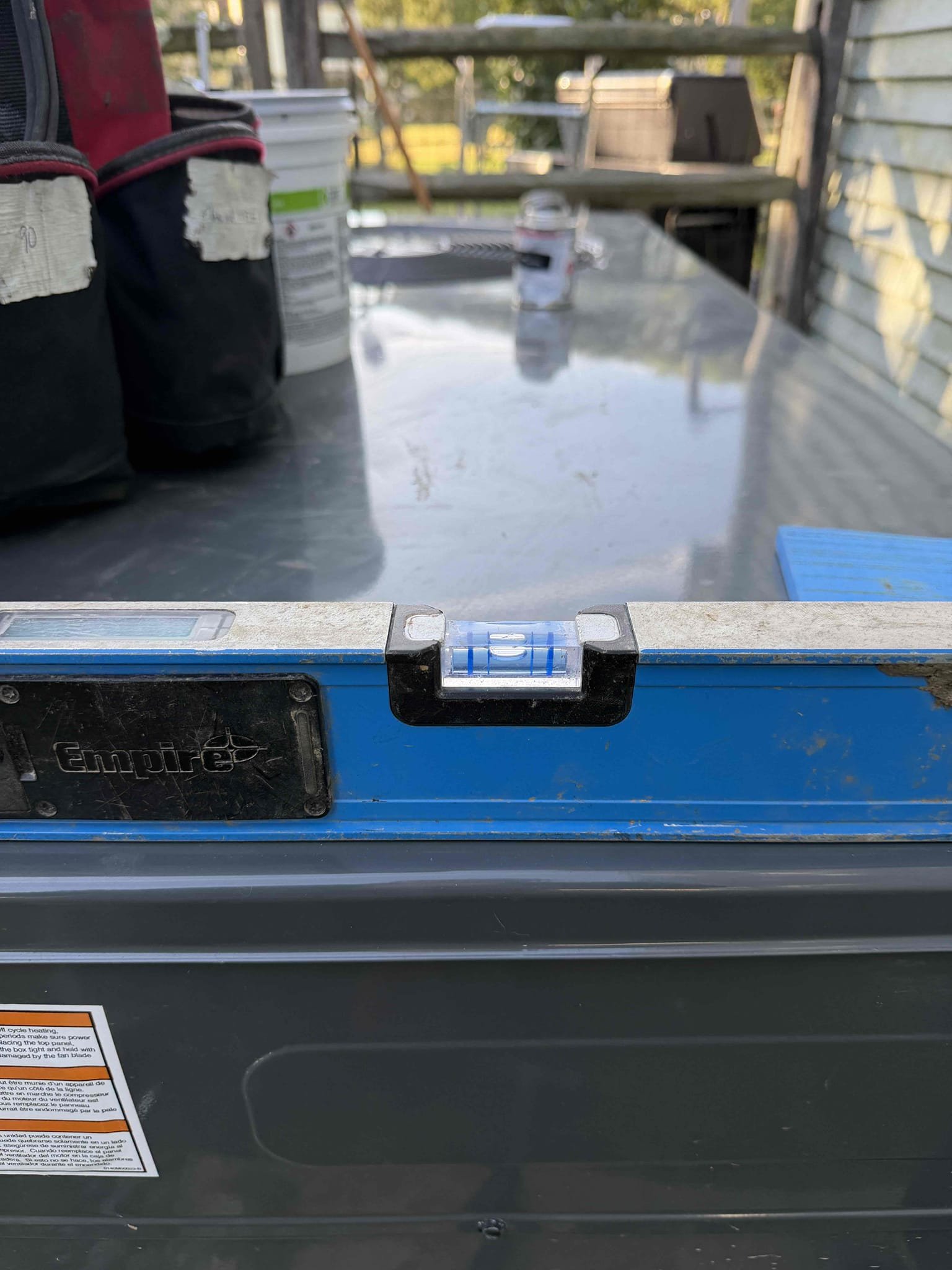 Releveled outdoor unit. Painted ductwork with mastic outside over tape joints. Caulked around disconnect. Relocated drain to customers preference. 
