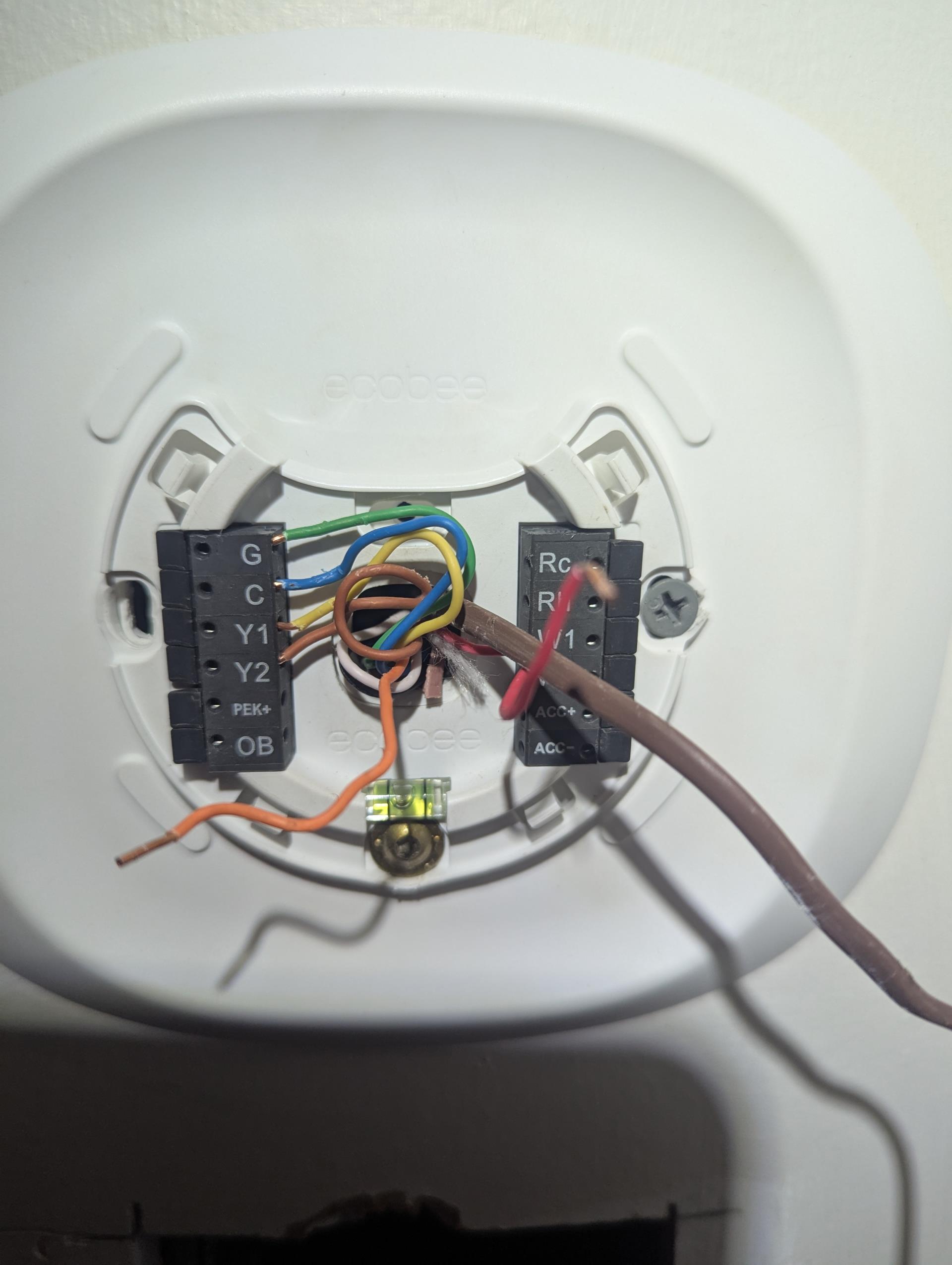 Blown 5A low voltage fuse at air handler.
Knick in low voltage wire just behind thermostat sub base.
This was installed by us. 
Ran new 18/10 in one icee between thermostat and air handler.
Replaced blown fuse. 
Tested system afterwards.
System operating well at this time. 
 Blown 5A low voltage fuse at air handler.
Knick in low voltage wire just behind thermostat sub base.
This was installed by us. 
Ran new 18/10 in one icee between thermostat and air handler.
Replaced blown fuse. 
Tested system afterwards.
System operating well at this time.