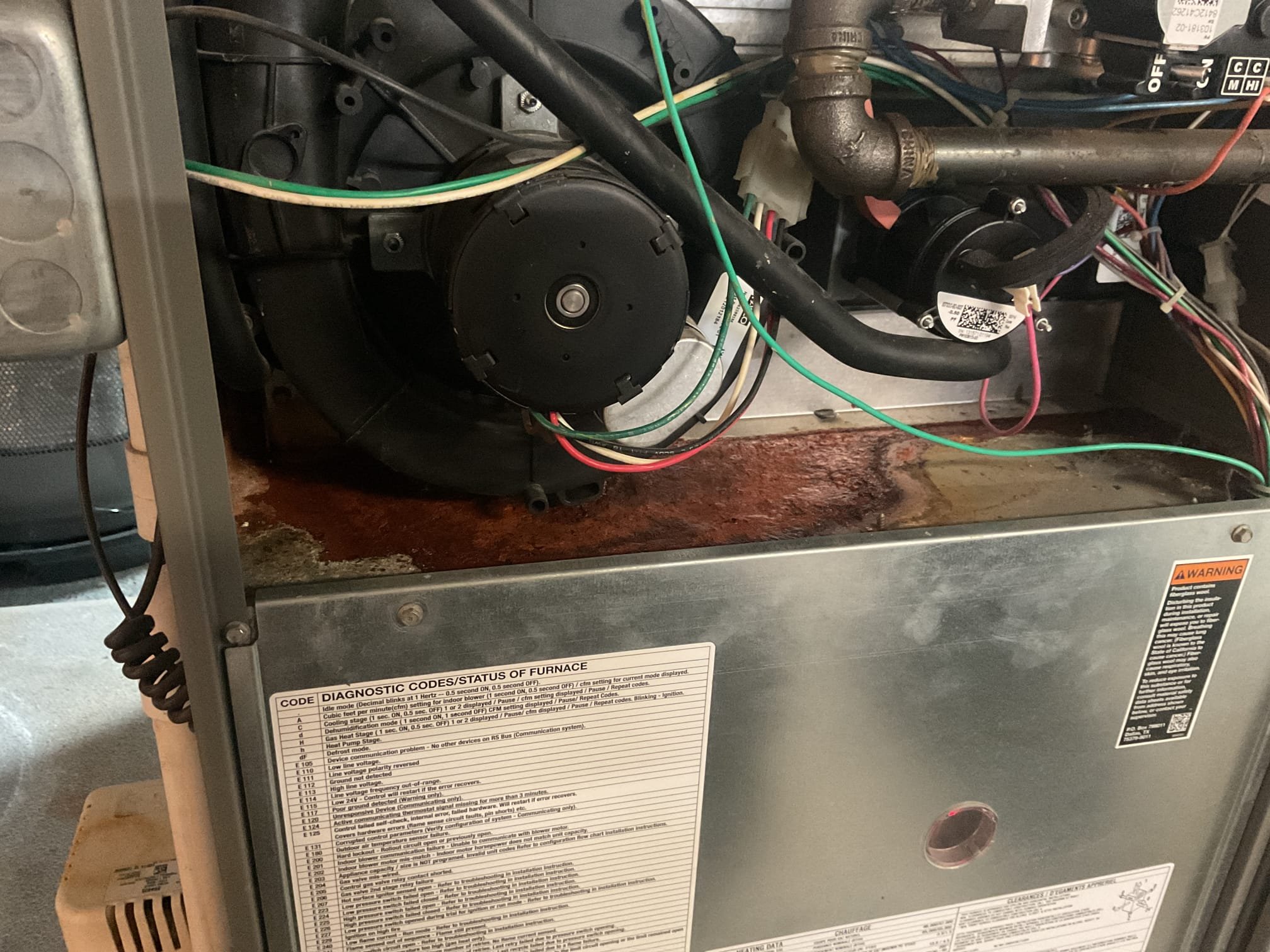 Fully assessed no heating situation. Found 2012 Lennox gas furnace locked out on e 227 ( low pressure switch opened during trial for ignition. Opened up cabinet and gave furnace a call for heat. Found inducer motor full of water. Pulled out inducer motor and found that it has been leaking for a long time inside cabinet, took photos. Also found no water protection on system with new basement floor being finished.   Provided estimate to install wet switch and new inducer motor, but this will not fix the furnace leaking water internally. Only way to stop water from leaking inside is to replace gas furnace. Recommend replacing system due to being a 2012. Water could eventually damage control board. Got furnace to work as of now after removing water from inducer motor. Performed combustion test. She is going to see how long it stays working. 