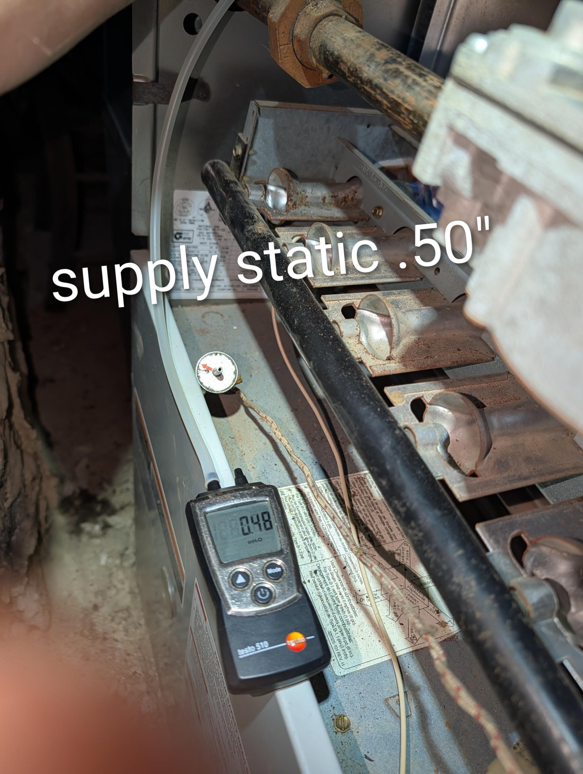 
Completed heat tune up for natural gas furnace. 132,000 BTU input 107,000 BTU output. It is a tad oversized. Furnace serial number dates it to 1999. However it has seen limited use. Recently moved into by previous owners son. Furnace is slightly oversized. 
HEAT ONLY 
There is an air conditioning coil above furnace but it is not piped into a condensing unit. Serial number dates it to late 90s. Presumably they originally intended to add AC but abandoned the idea. 

16x25x1 filter ok. Use Fiberglass filters only to avoid overheating heat exchanger. 
Inspected heat exchanger, burners, flue pipe, inducer assembly and hoses
Polished crossover ports and front face of inshot burners with wire wheel. Recommend and provided estimate for replacing (6) burners. Some surface rust and some rust on sides of burner box.
Some rust on heat e changer surfaces and seams 

Needs new exhaust. There are pinholes which are very likely to become larger and the fitting closest to chimney base is loose. I adde