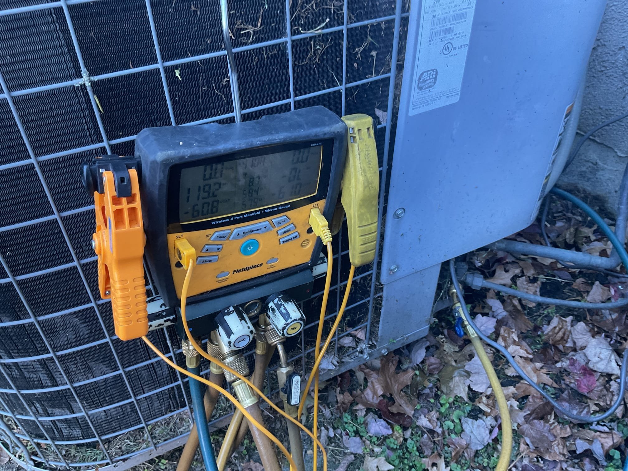 Looked over system. Put gauges on outside heat pump. Found 2004 carrier heat pump completely out of 410a refrigerant. Neighbor was mowing and rock hit outside coil. Told son that we will need to do some research to see if this outdoor coil is still made. We also don’t know if indoor coil is leaking at this point. If nothing is available entire system would need replaced. Our office will call distributor to find out more info, distributors are closed at this time. 