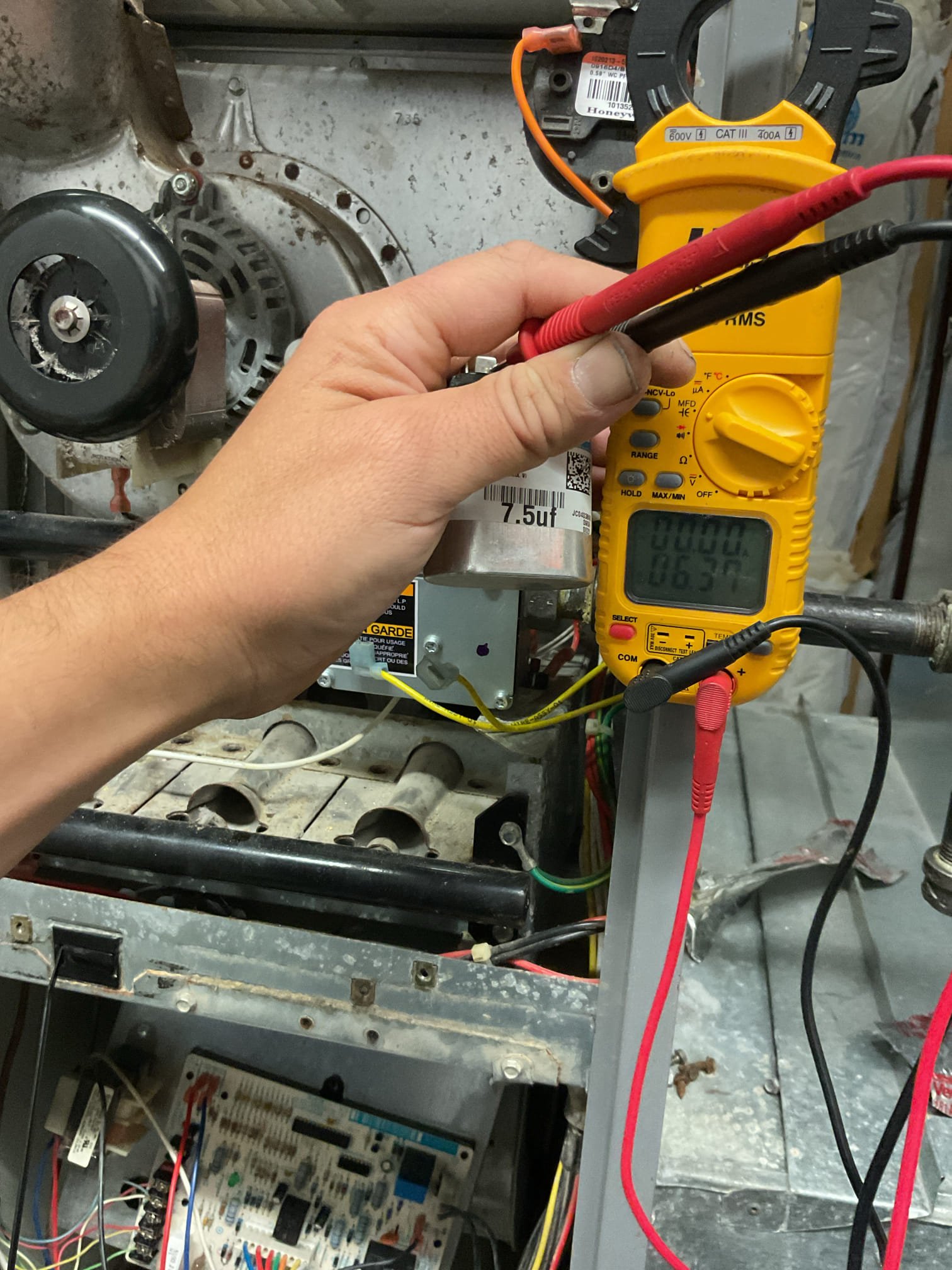 When I arrived homeowner explained that he had shut power off.

The W conductor was taken out of the furnace terminal block.

When I turned system on..even without 24V to the W terminal, the inducer ran and caused the (2) flash error code “ pressure switch closed when should be open”. Control board has failed such that inducer motor is continuously energized even when there is no demand for heating from the thermostat.

I manually took the pressure switch wire off and back on to be able to “fake out” control and test heating components and trial for ignition.
Ignitor reading within ohm valve but does have white discoloration. 
Gas valve opens and flame sense signal good.
Combustion test pass. 

Blower capacitor reading weak by more that 10% of rated value recommend replacing.

Made (4) Estimates 
1. Minimum required repairs: Replace control board
2. Minimum repairs+ blower capacitor: Replace furnace control and blower capacitor 
3. Replace furnace control, blower capacitor AND hot surf