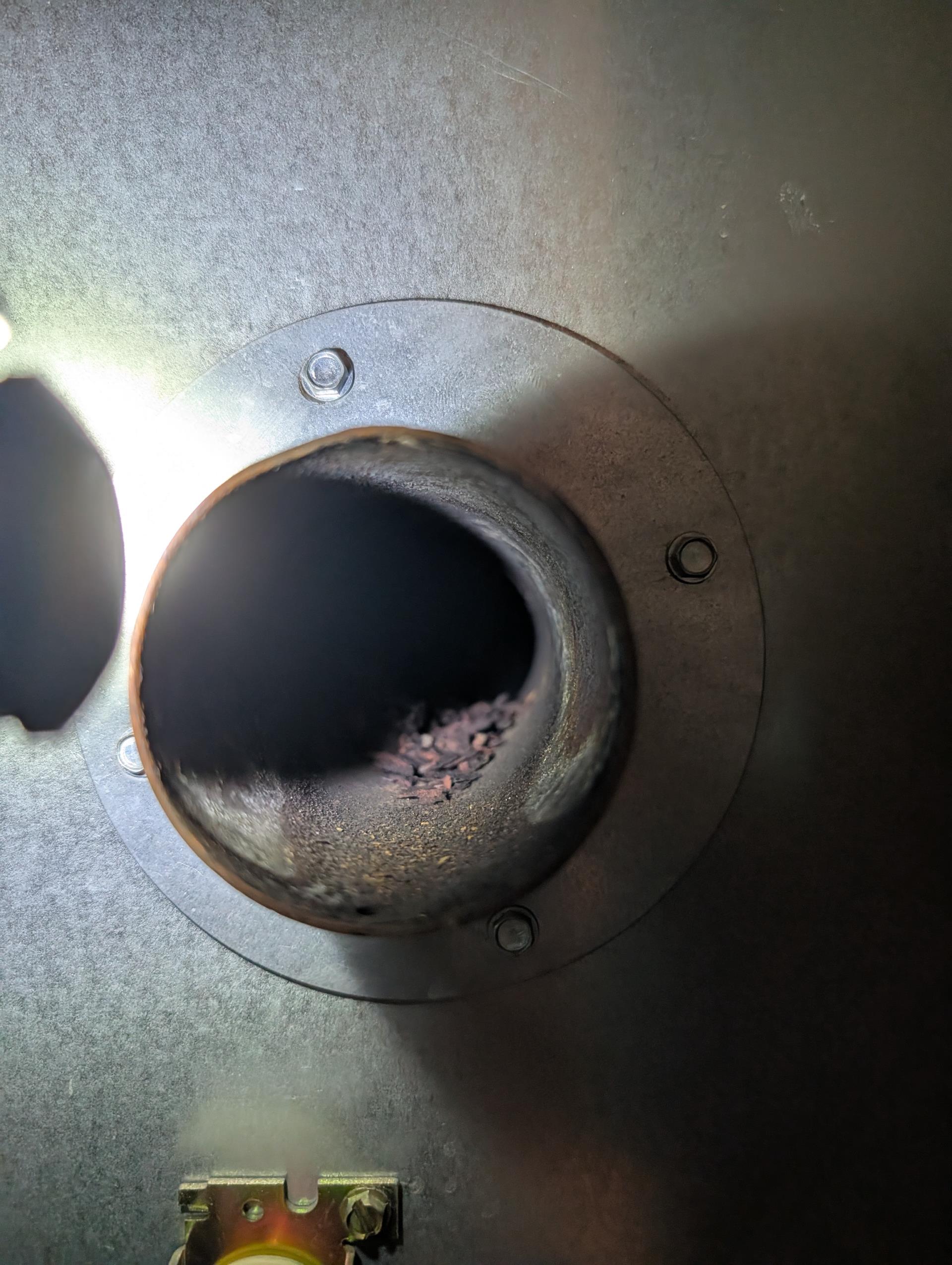 Completed heat tune up for Armstrong Air  oil furnace. 1999. 

20x20x1 filter ok
Cleaned heat exchanger and inspected flue piping and chimney. Some breakdown and rust but no cracks. 
Replaced oil filter, strainer with gasket and nozzle (.85 80B) oil filter was very gunked up as a result of running tank empty as was strainer and nozzle. Oil filter canister had rust spots on bottom. Recommended replacement due to potential for pinhole leaks. She agreed to new filter canister. Completed work today. 
Inspected electrode condition and alignment, transformer, cad cell eye, and air bands for debris. Electrodes were severely worn flat recommended replacement. She agreed. Completed work today. 

Inspected wiring, controls, electric motors and components including fan speeds. 12.5 uF capacitor reading 9.33 which is greater than 10% out of ideal tolerance.and terminals very rusted. Offers to replace. A surge protector can be installed on system, left estimate 

Bled oil line and tested system

Co