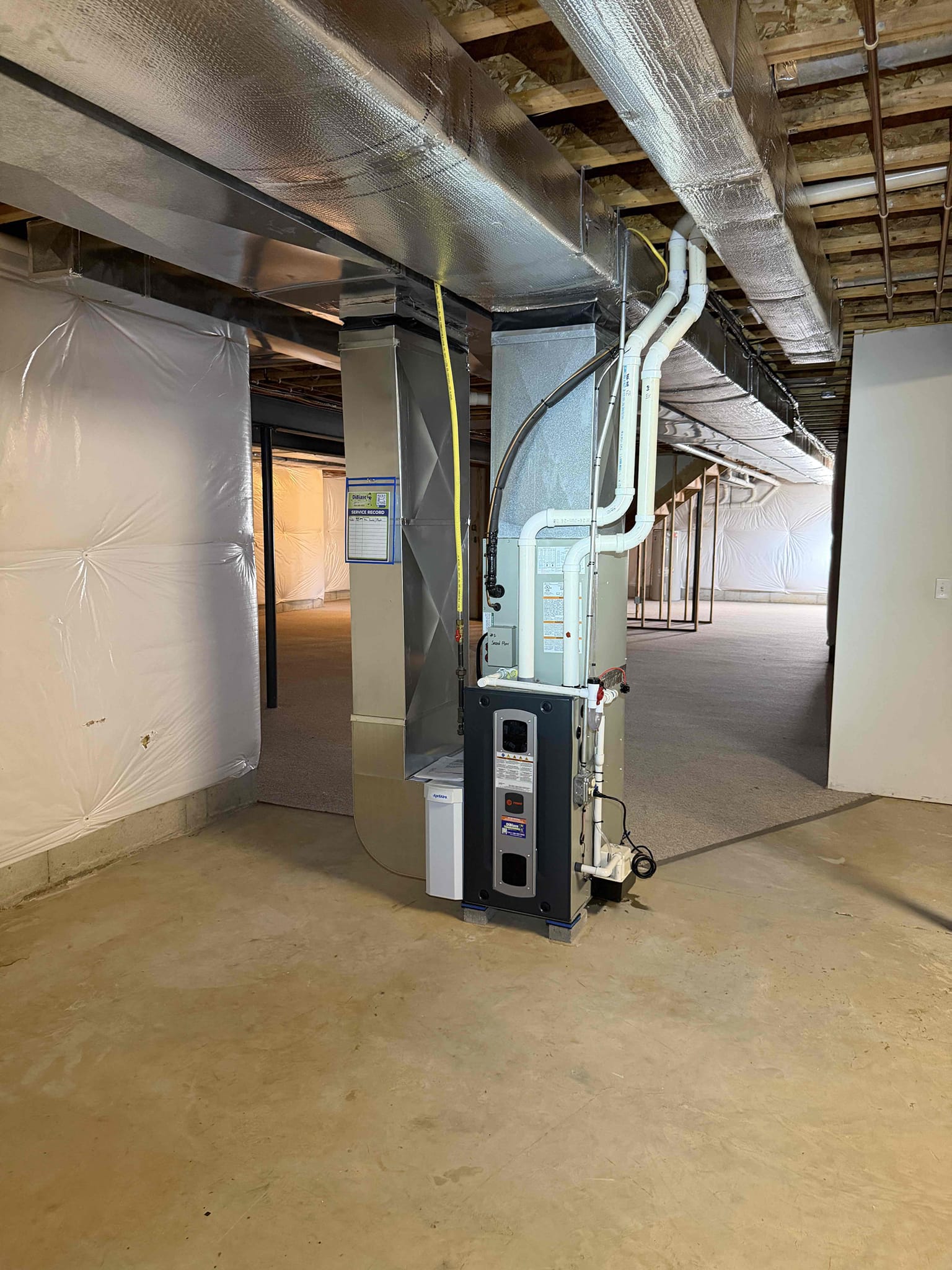 Installed new trane gas furnace and ac coil built new return and reused supply. Tapped/caulked return and supply. Adapted high volt and installed new outlet and switch. Ran new condensate line and installed new ez trap and condensate pump. Ran new vinyl tubing from pump to seer drain located in basement. Adapted gas line and vent piping to new furnace. Installed new thermostat provided by customer and wired in low volt with safeties. Flushed existing line set and connected to new equipment. Installed new A/C outdoor on leveled pad. Installed new disconnect with surge protector and wired it into outdoor unit. Cleaned up work area and tested out equipment.

To cold at time of install to properly test out A/C. Will have to return in the summer to adjust charge. Used the rest of my bottle to fill. 

Did not collect payment as customer was not home at completion of job