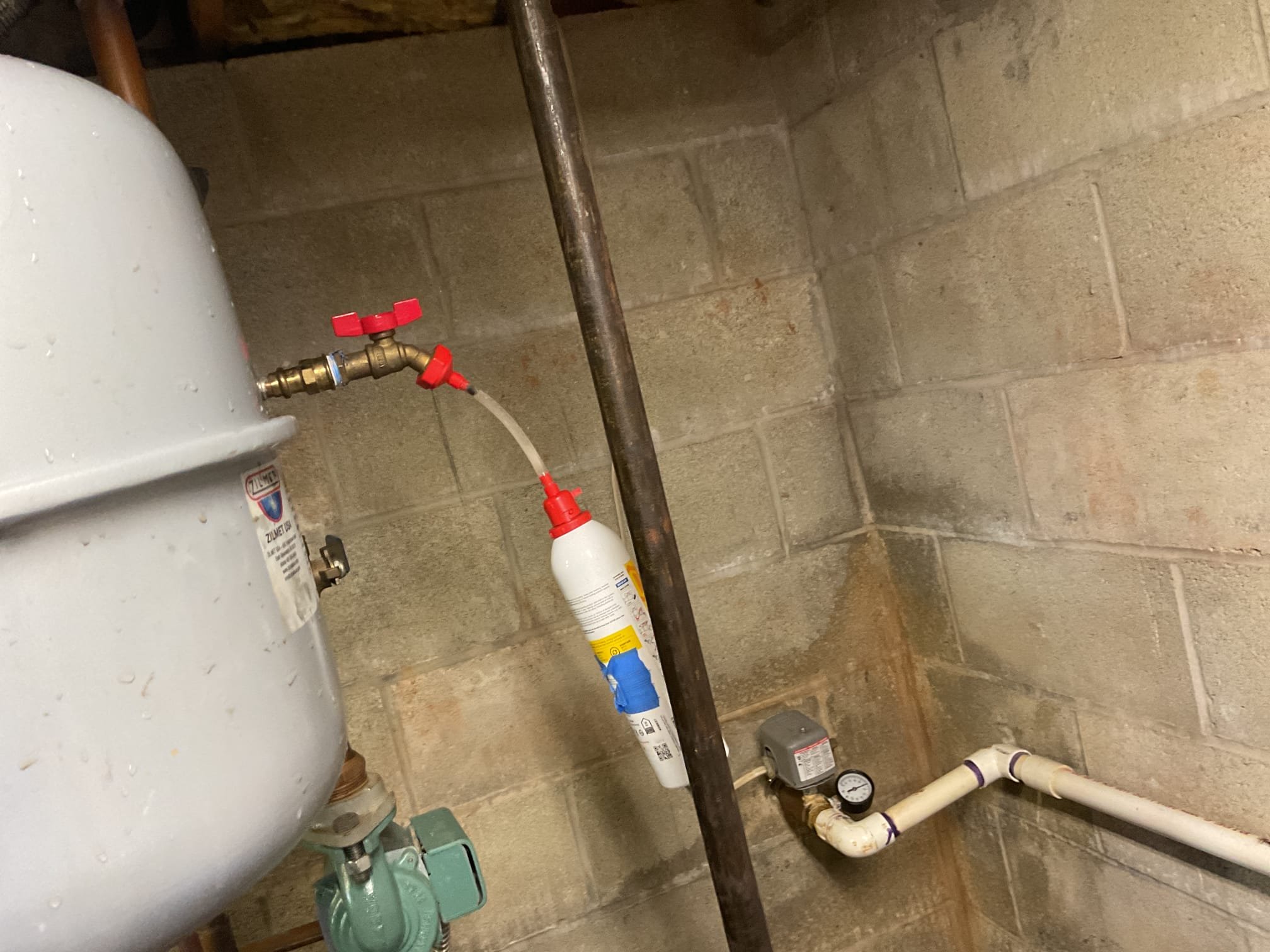 Drained down boiler enough to install new air strainer. Installed strainer and new 1/2” brass ball valve going to expansion tank. Bleed air out of system and injected sentinel x100 inhibitor. Tested operation of the boiler. Spirovent is working properly at time of service. 