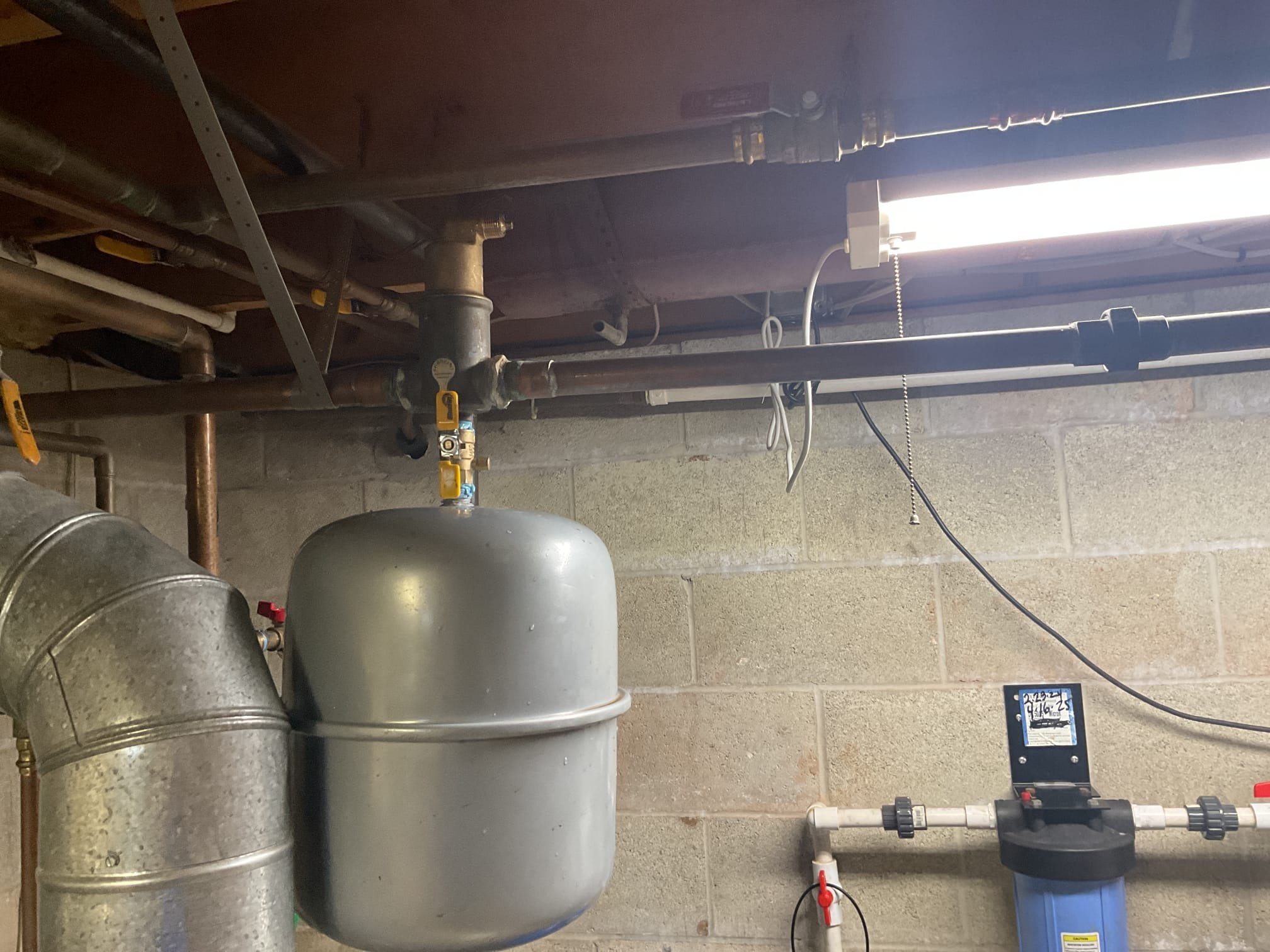 Drained down boiler enough to install new air strainer. Installed strainer and new 1/2” brass ball valve going to expansion tank. Bleed air out of system and injected sentinel x100 inhibitor. Tested operation of the boiler. Spirovent is working properly at time of service. 