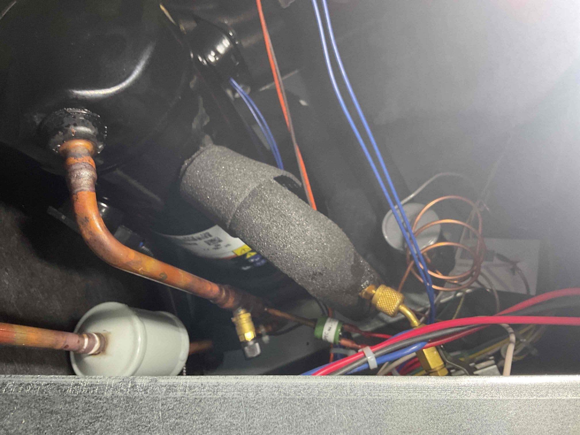 Fully assessed no heating situation. Found compressor hot to the touch on split system geo but not running. Tested 40 mfd capacitor, found that it tested at 41 mfd. found 243 v going thru contacter but compressor was not running. System is from 2022. Suggested to homeowner that we add an ssp6 hard start to see if it gets compressor running. Installed and compressor started right up. William may add hard starts to all systems after doing research. Checked loop temperatures took photos. Checked air temperature rise it was 21 degrees and back up hydronic coil was working correctly. Geothermal heat pump is working properly at time of service. 
Add hard start capacitor. 